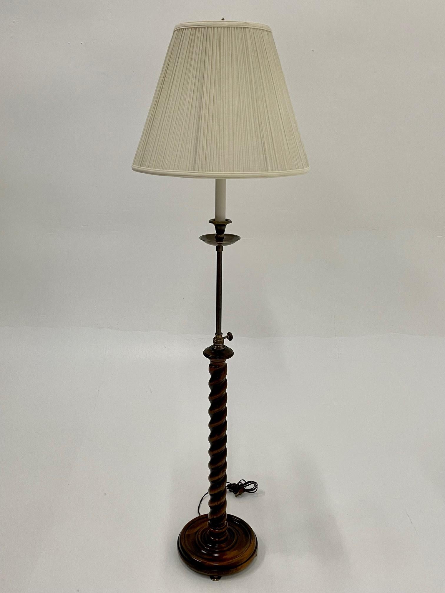 Mahogany & brass floor lamp having handsome barley twist on adjustable column. Faded Frederick Cooper label. Shade not included.