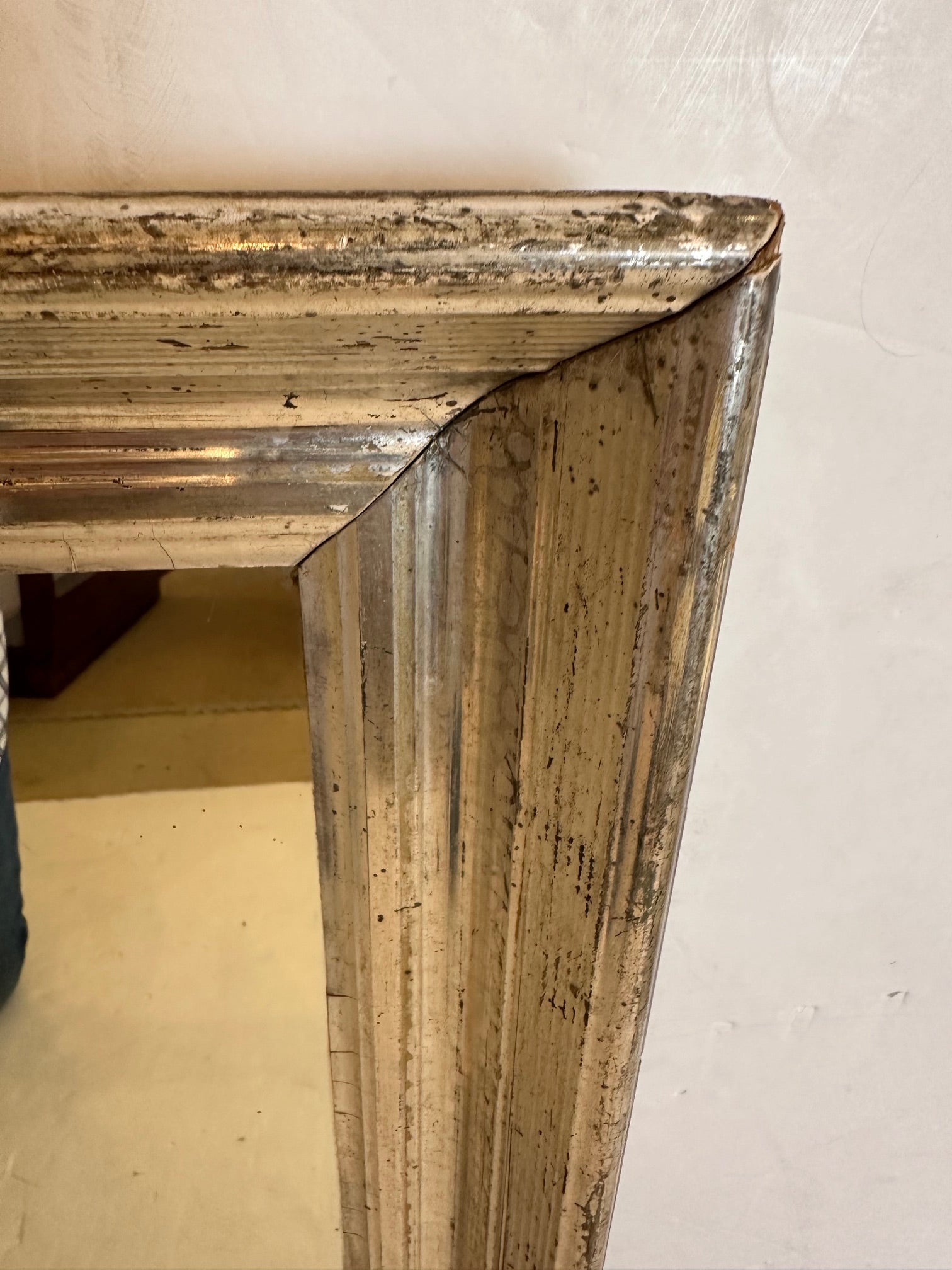 Handsome rectangular chunky silver gilt wall mirror from France.