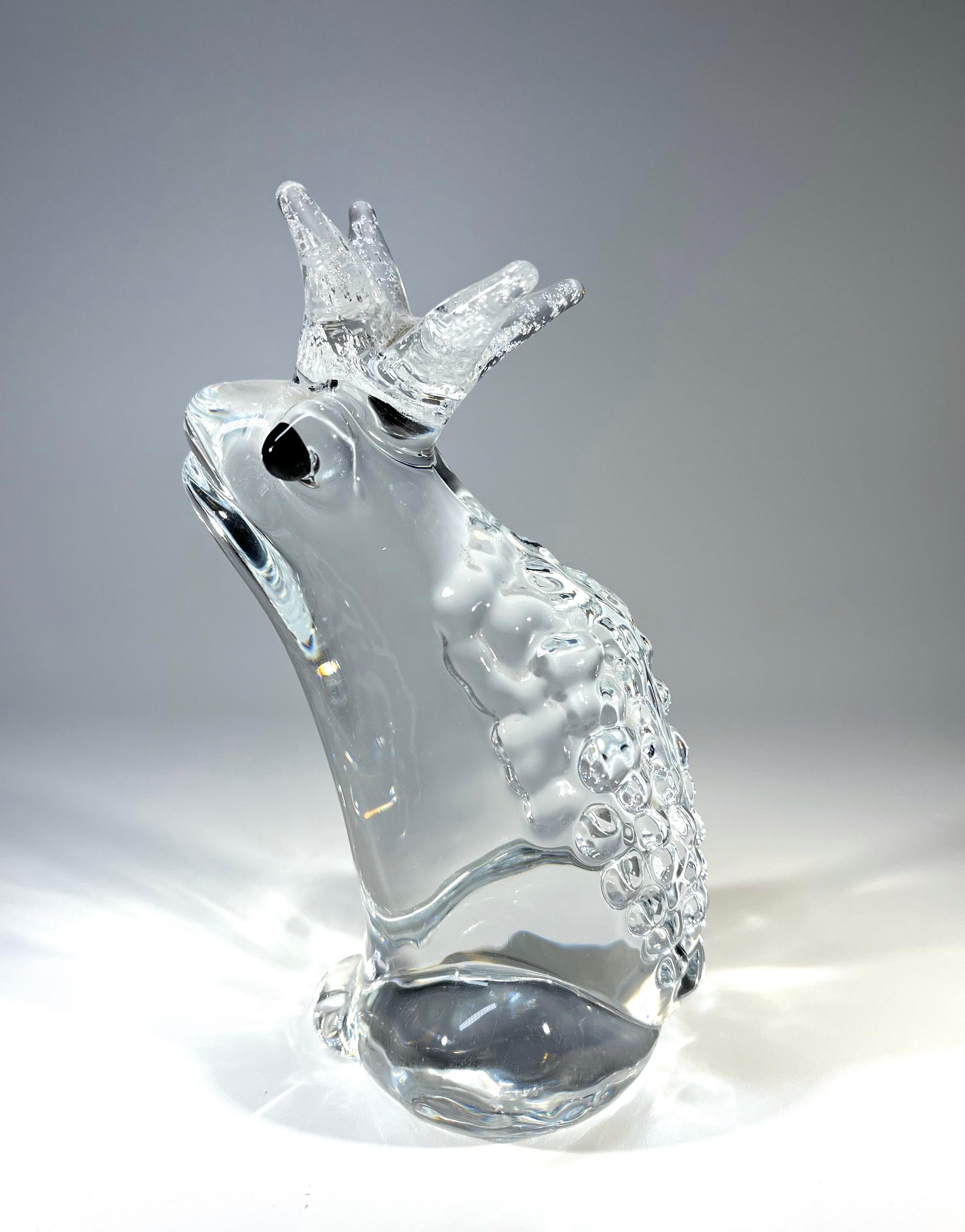 Wearing a crown of silver inclusions, a handsome frog prince paperweight of clear crystal by Marcolin, Sweden
Italian brothers Josef and Benito Marcolin founded Marcolin in Sweden after learning their craft on the island of Murano, Venice
Circa