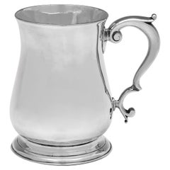 Handsome George II baluster shaped sterling silver pint mug made in 1751