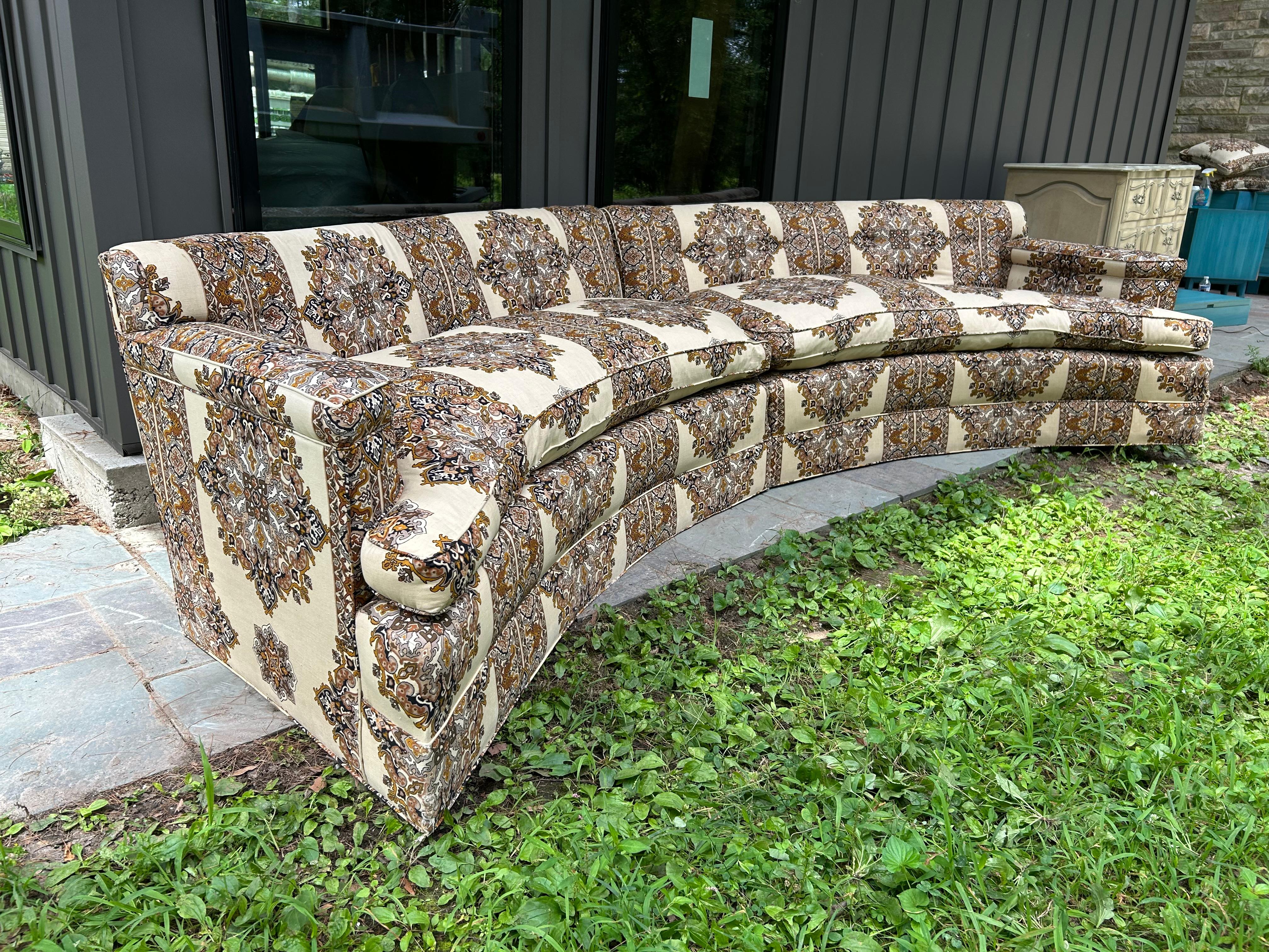 Handsome Harvey Probber attributed 2 piece curved sectional.  We just love the original Bohemian linen upholstery in usable vintage condition.  It does have some light signs of wear but the original fabric is just fabulous if your not too fussy. 