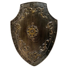 Handsome High Relief Brass Repousse and Tole Shield.