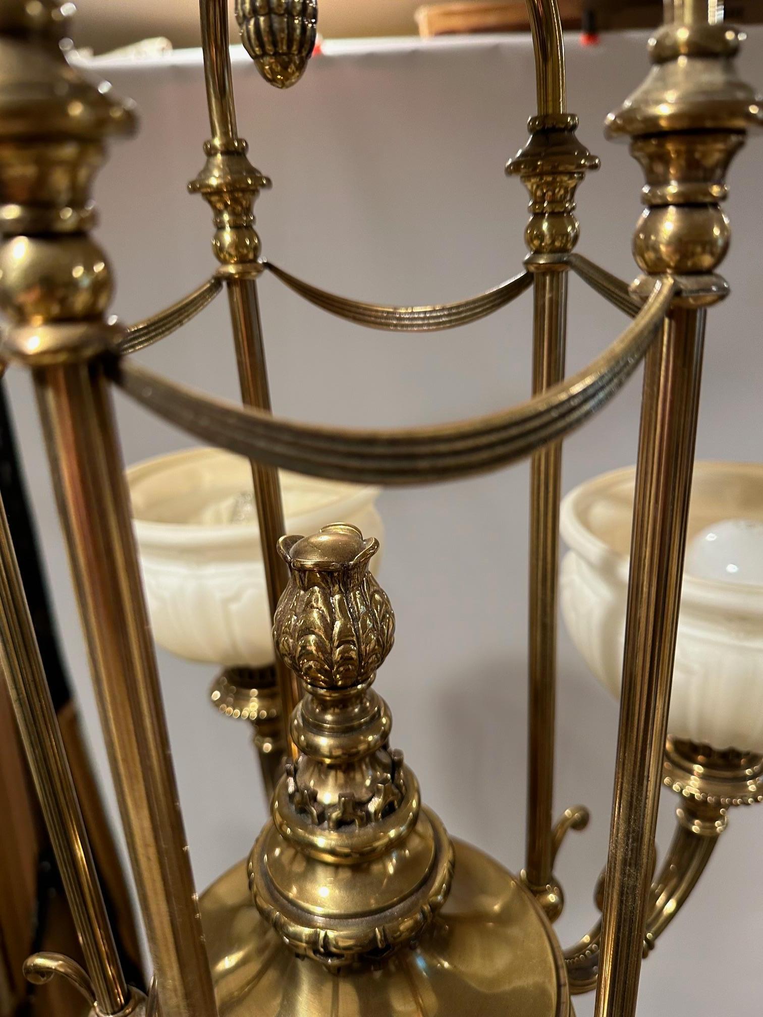 American Handsome Kitchler Brass and White Opaque Glass Chandelier with 5 White Globes