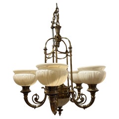 Handsome Kitchler Brass and White Opaque Glass Chandelier with 5 White Globes