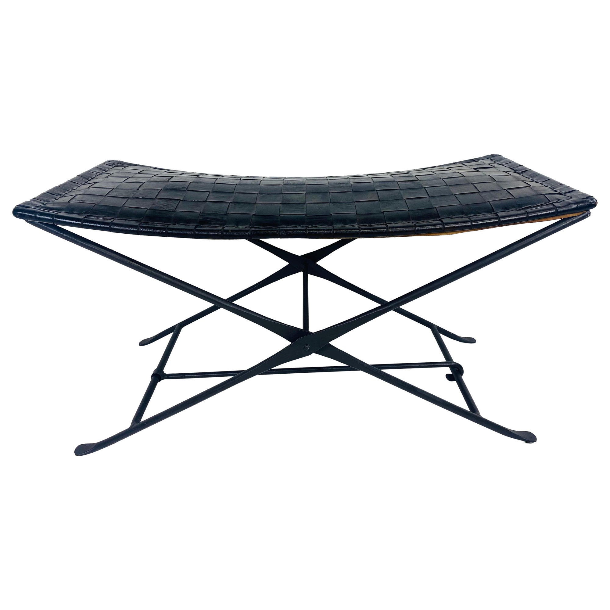 Handsome leather and wrought iron military campaign sale bench.