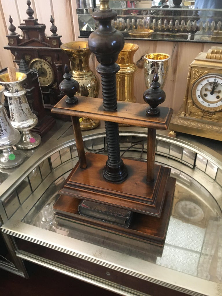 Handsome library book press lamp and candlestick lamp. Attributed to Frederick Cooper, great attention to detail. Perfect for a library. Height is to the top of the finial. Priced per lamp, both lamps compliment each other in style and scale.