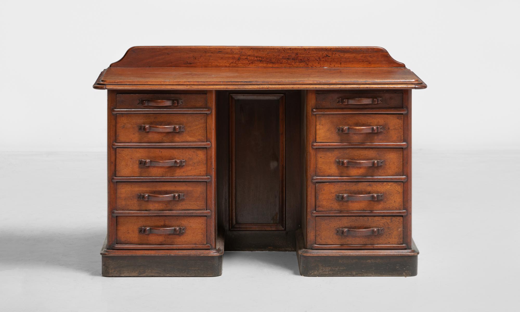 Handsome Mahogany Writing Desk, England, circa 1930

Small-scale desk made of mahogany wood. With amazing patina and carved wooden handles.
