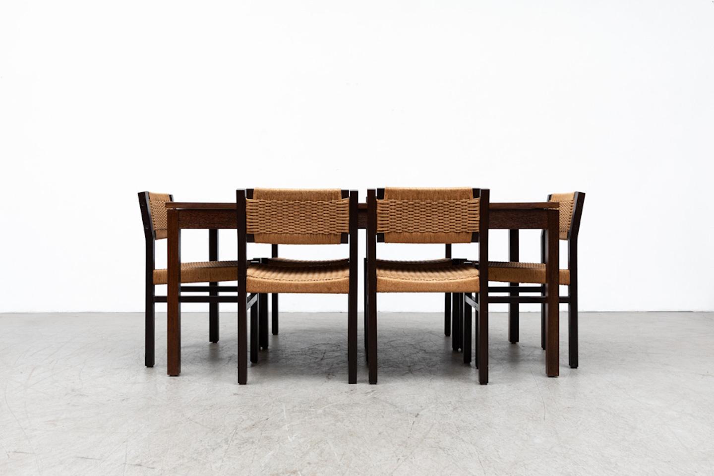 Handsome Fristho Wenge extendable dining table. The table top slides to the side and the leaf is housed underneath. Leaf is 19.625