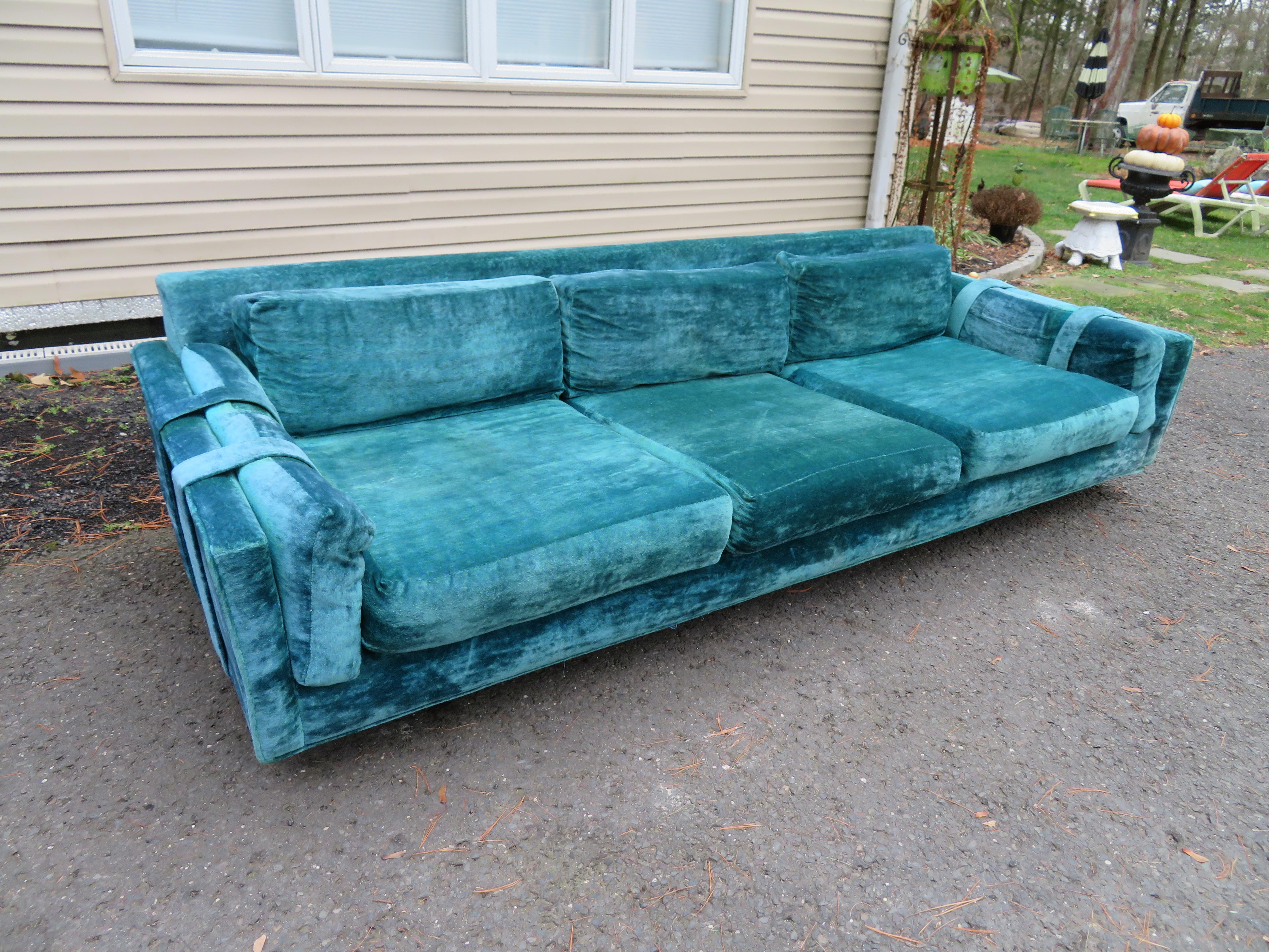 Handsome Milo Baughman style low profile velvet sofa on a plinth base. The turquoise crushed velvet is original and still has some life left in it! If your looking for a very comfortable vintage look, this sofa is for you. The original fabric does