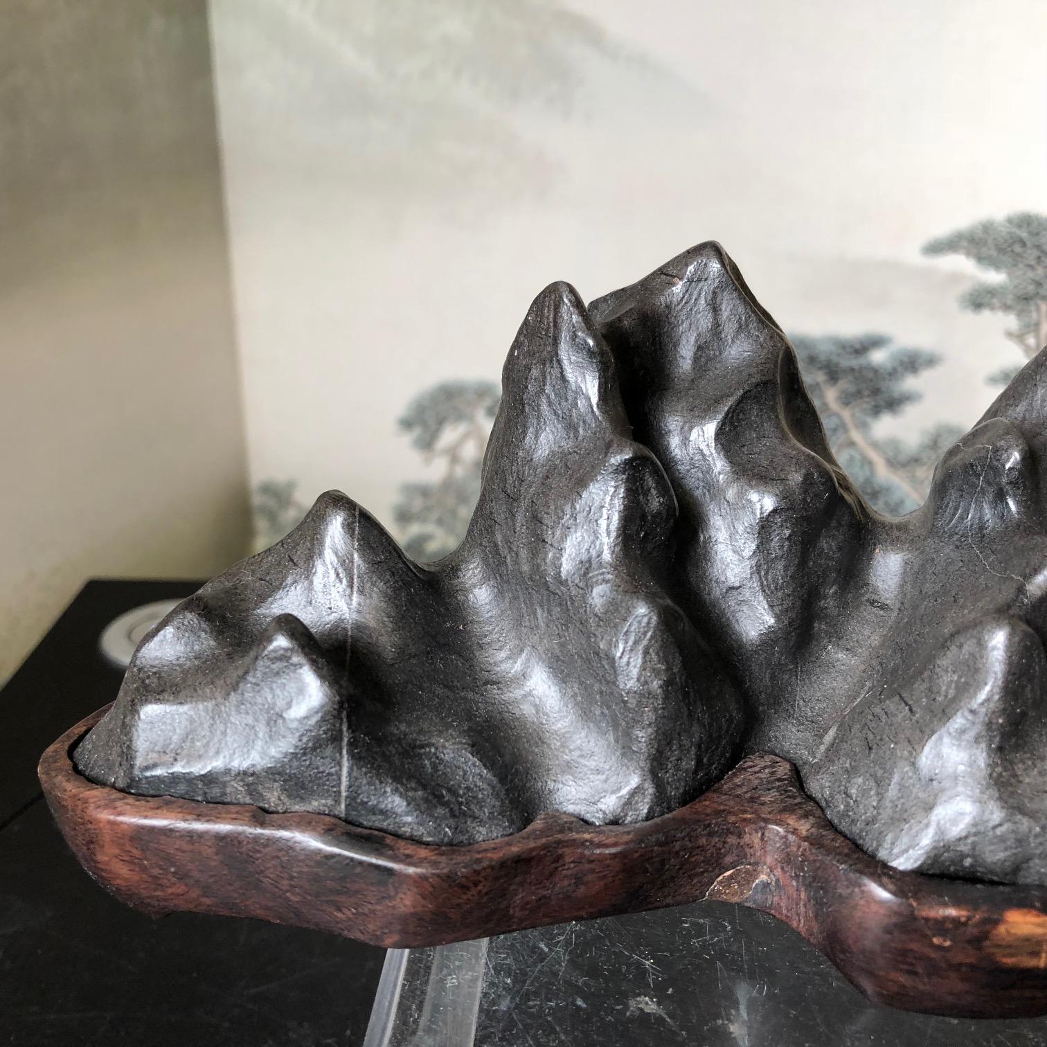 A very nice tall mountain scholar rock, natural bonsai Suiseki with nine high peaks and 10.5 inches long.

What do you see: mountains, trails in the Rockies or Himalayas?

Here's a great one-of-a-kind sculptural candidate for your special Asian