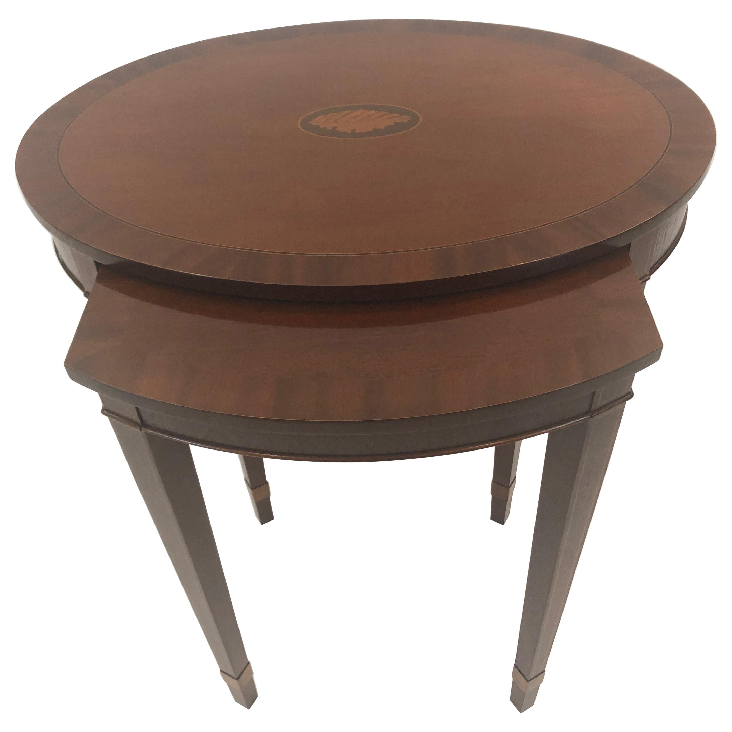 Handsome Oval Mixed Wood Inlaid Nesting Tables by Baker