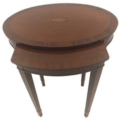 Handsome Oval Mixed Wood Inlaid Nesting Tables by Baker