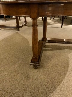 Handsome Oval Shaped Dining Table with Star Inlay in the Top, V-Shaped Stretcher