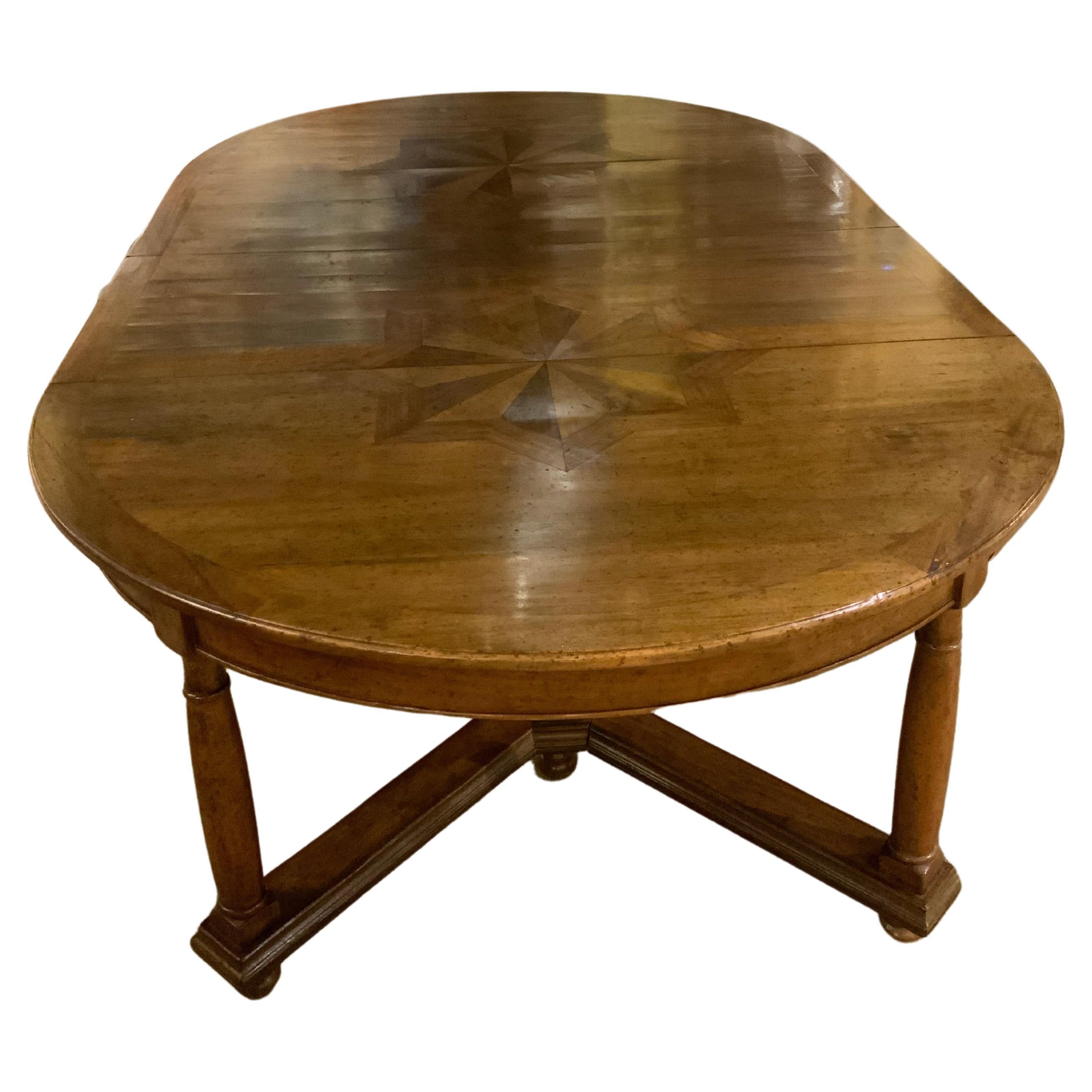 Handsome Oval Shaped Dining Table with Star Inlay in the Top, V-Shaped Stretcher