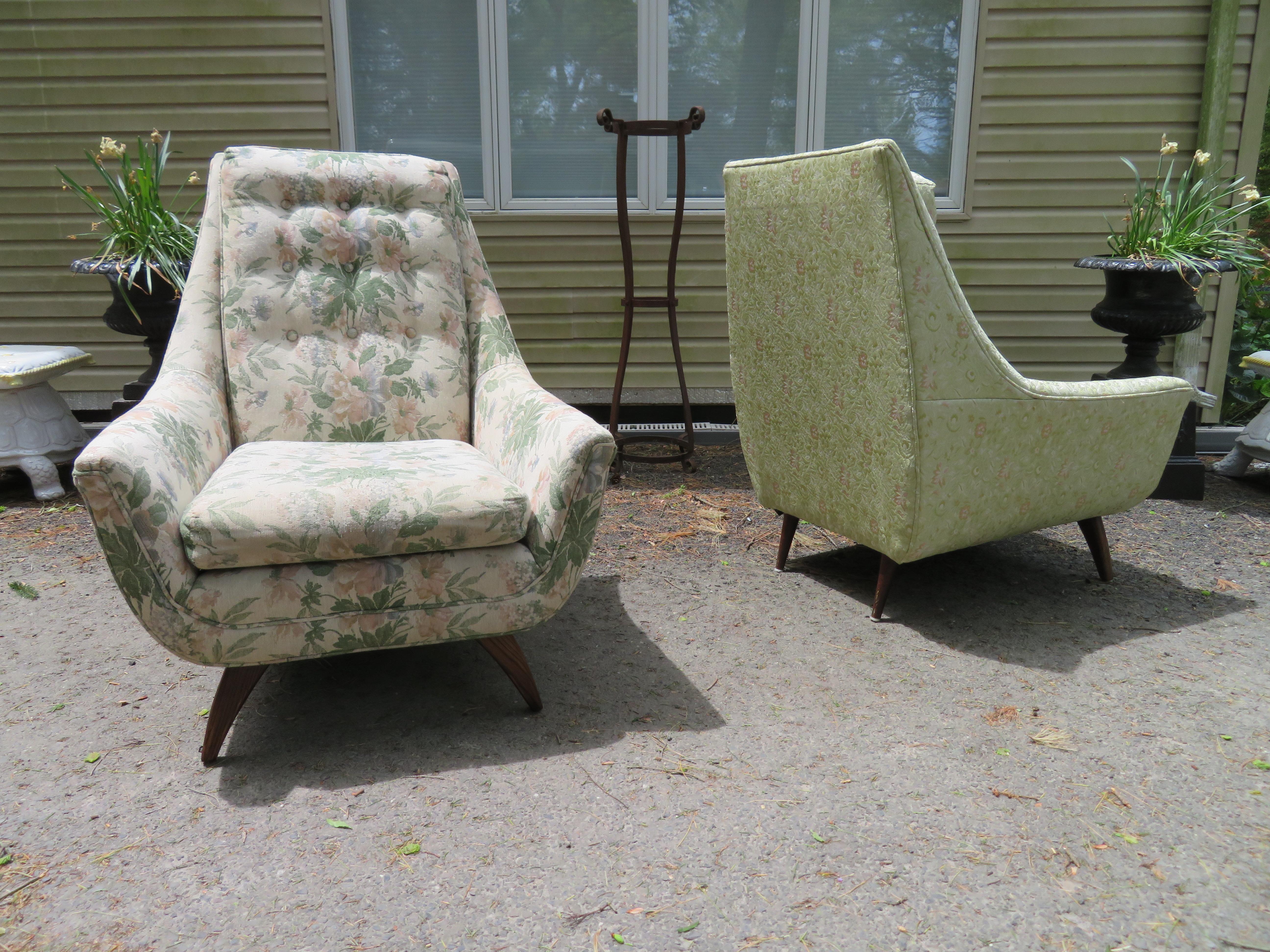 Handsome pair of tall back Adrian Pearsall style scoop lounge chairs. These chairs are made by the Bassett Furniture Company and were usually sold in sets call His + Hers sets with one chair being taller than the other. So finding a pair with both