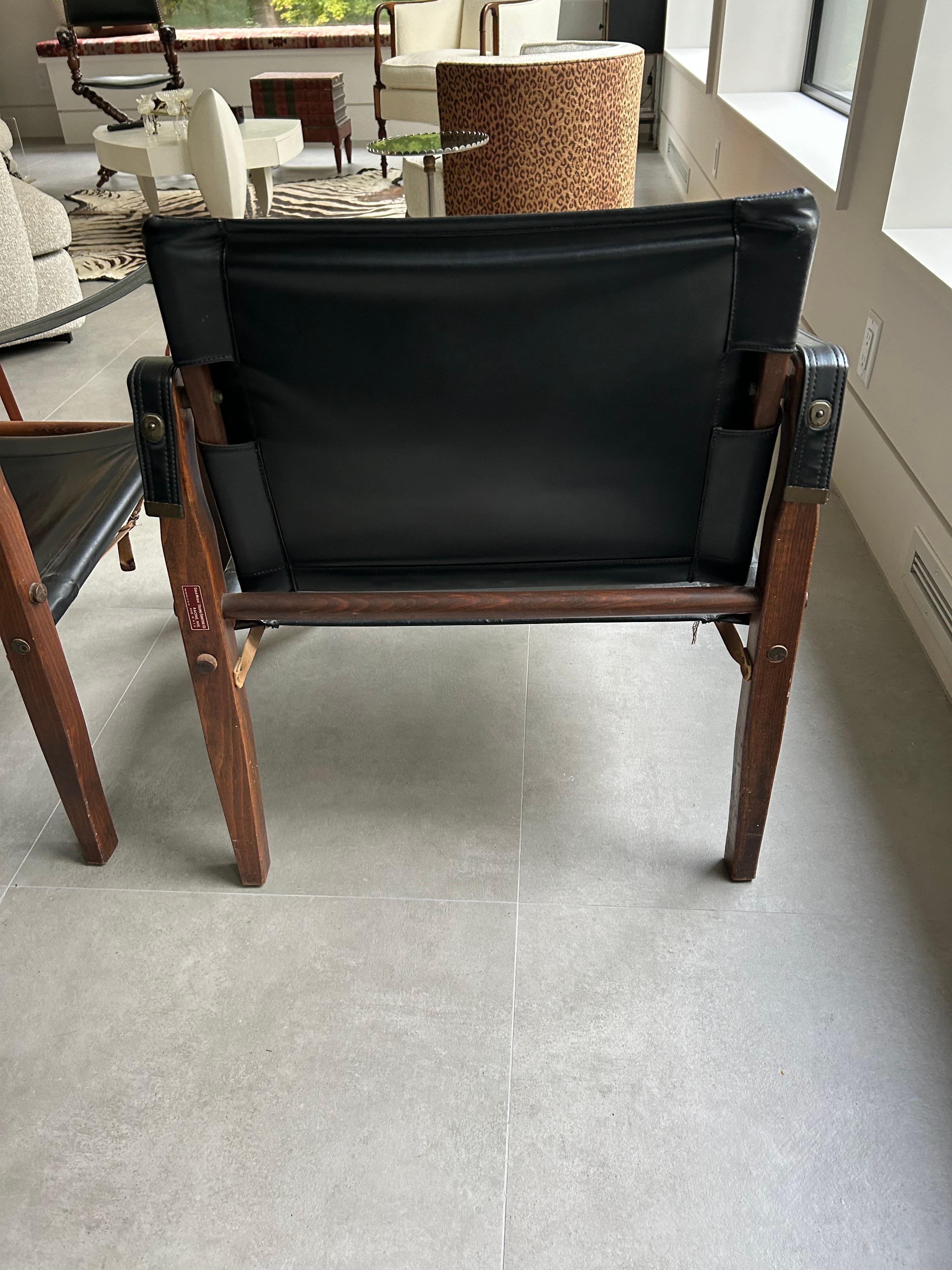 Mid-20th Century Handsome Pair Black Leather & Mahogany Gold Medal Safari Style Campaign Chairs