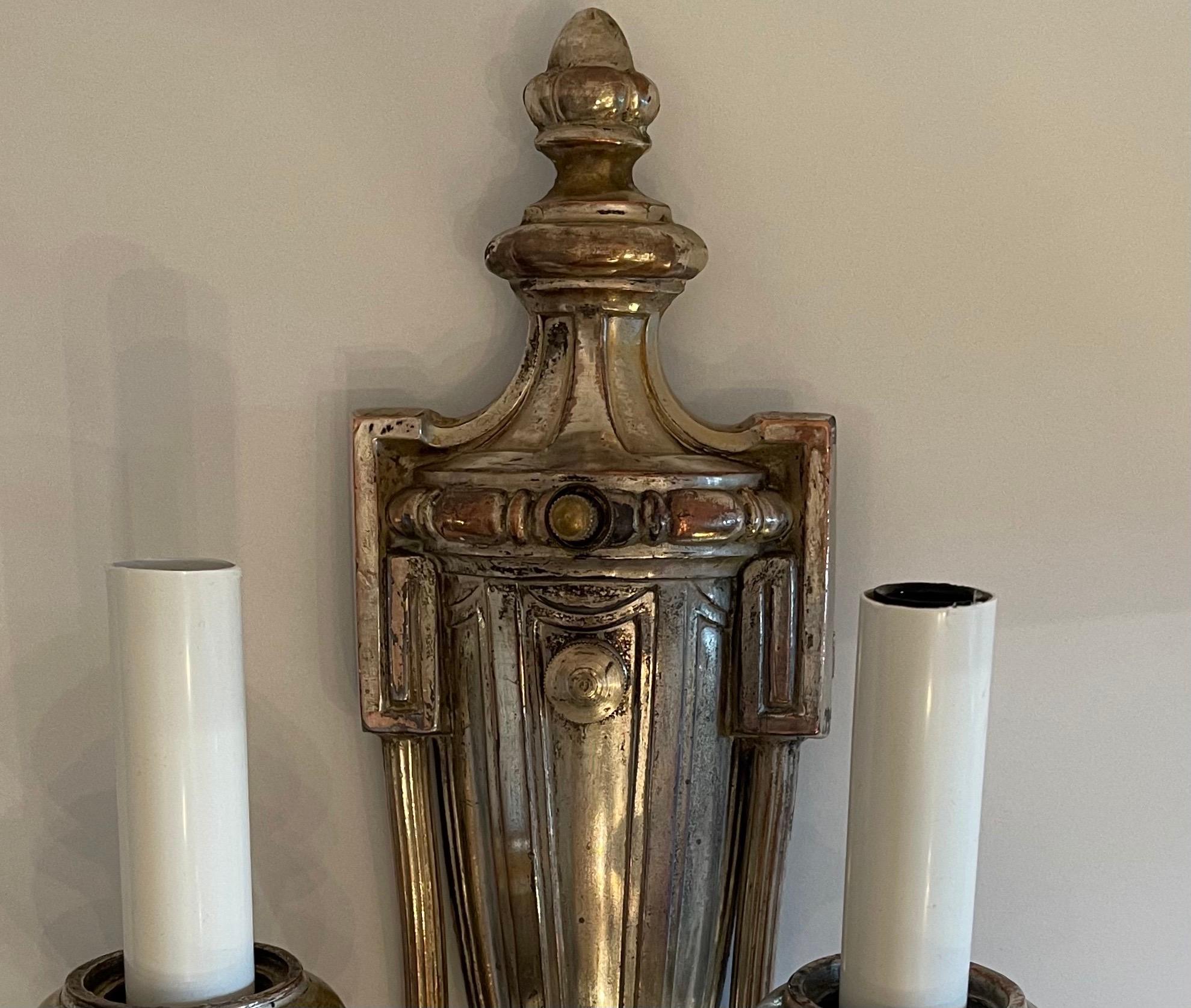 Handsome Pair of Caldwell Silvered Bronze Adams Regency Urn Two-Light Sconces In Good Condition For Sale In Roslyn, NY