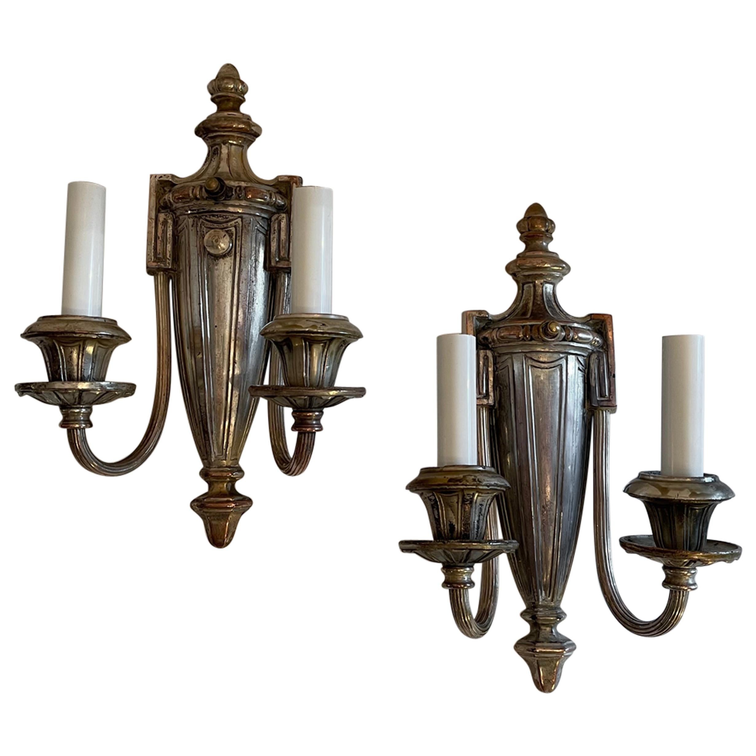 Handsome Pair of Caldwell Silvered Bronze Adams Regency Urn Two-Light Sconces For Sale