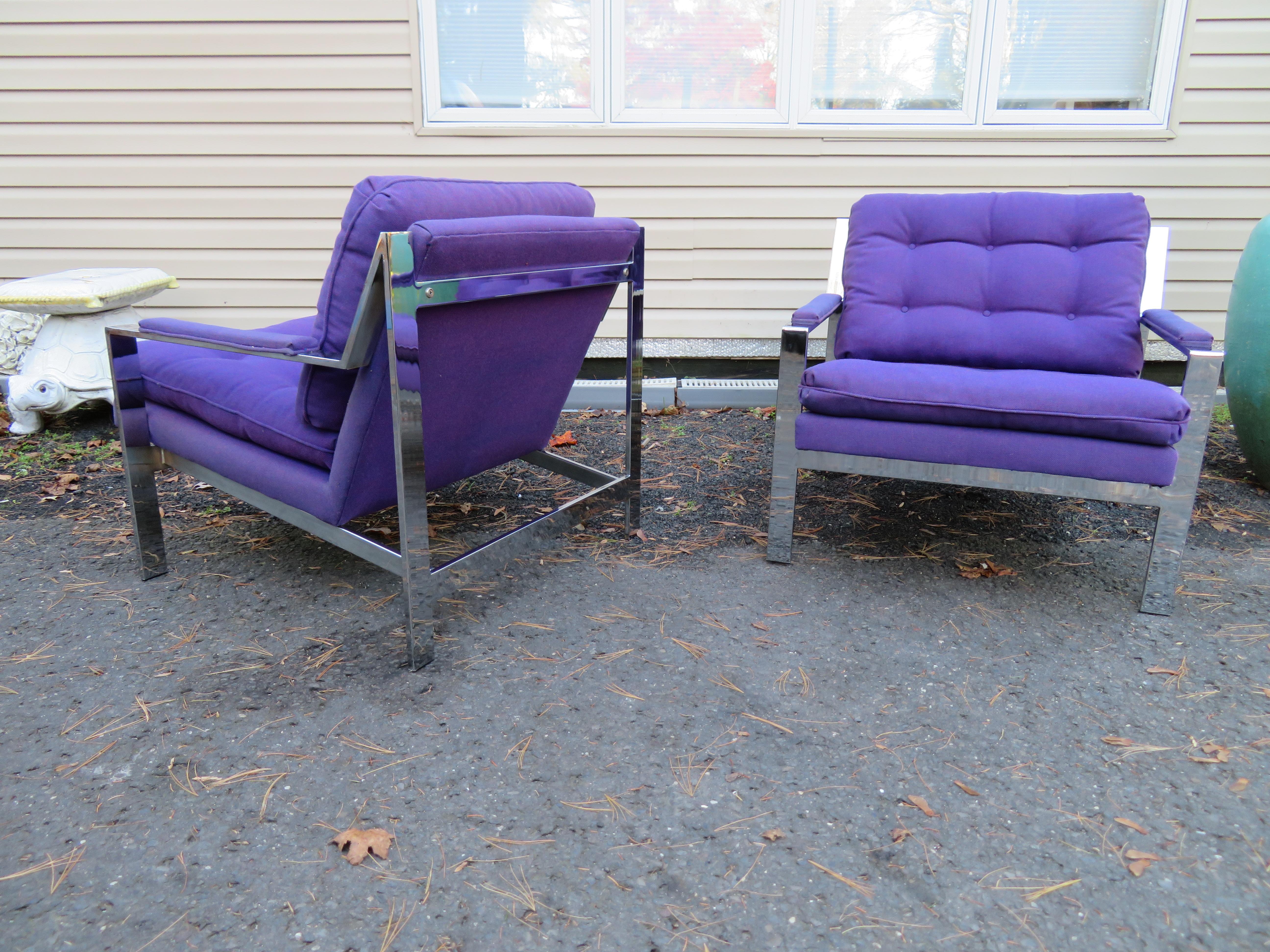 Handsome pair of Cy Mann chrome lounge cube chairs. These chairs are often misattributed to Milo Baughman but both are brilliant mid-century designers! This pair retains their original purple woven fabric in wonderful vintage condition-very usable