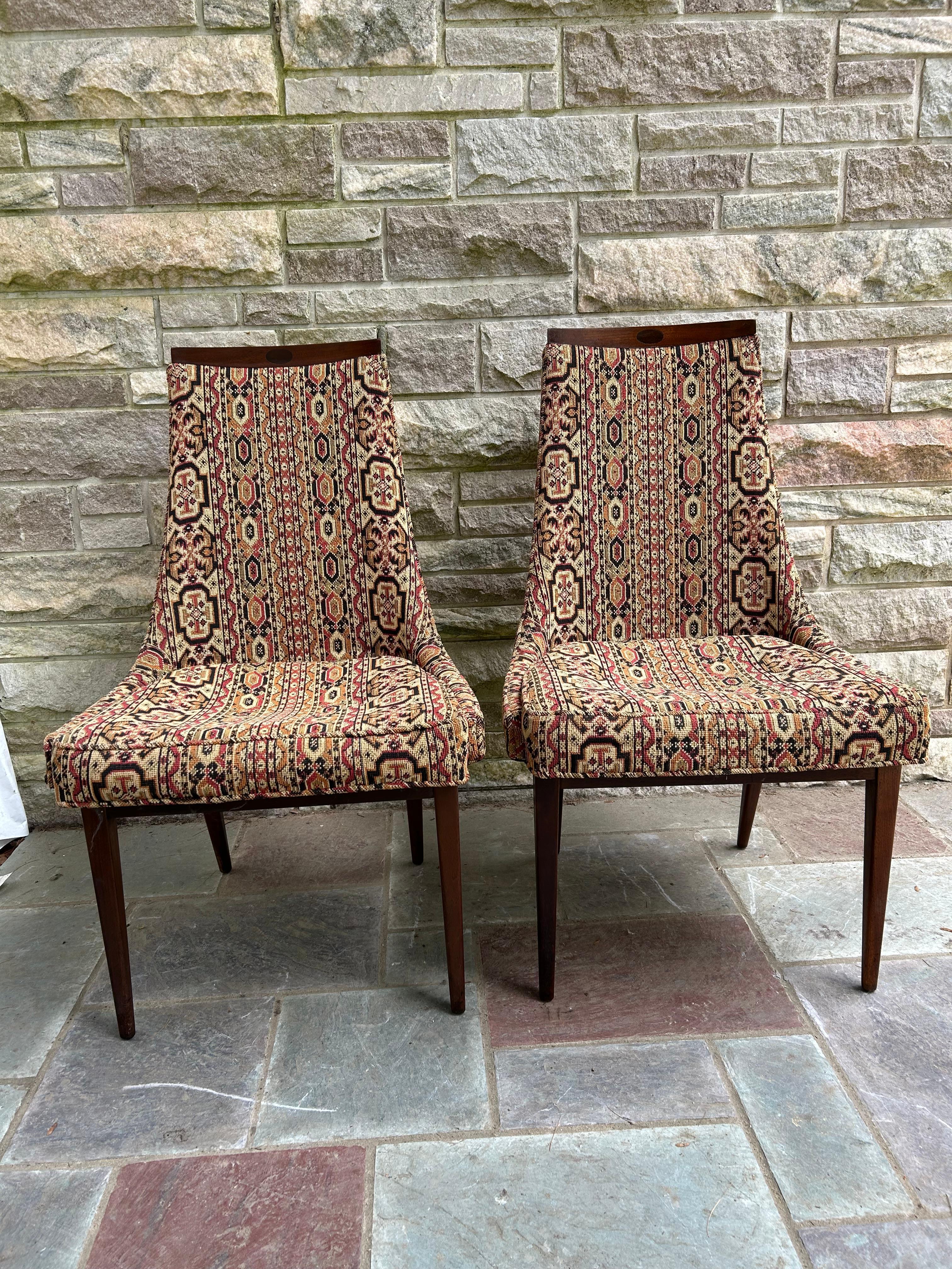  Dining chairs in Walnut by Kipp Stewart for Calvin. Very well made, elegant and comfortable.  Each chair measures 38