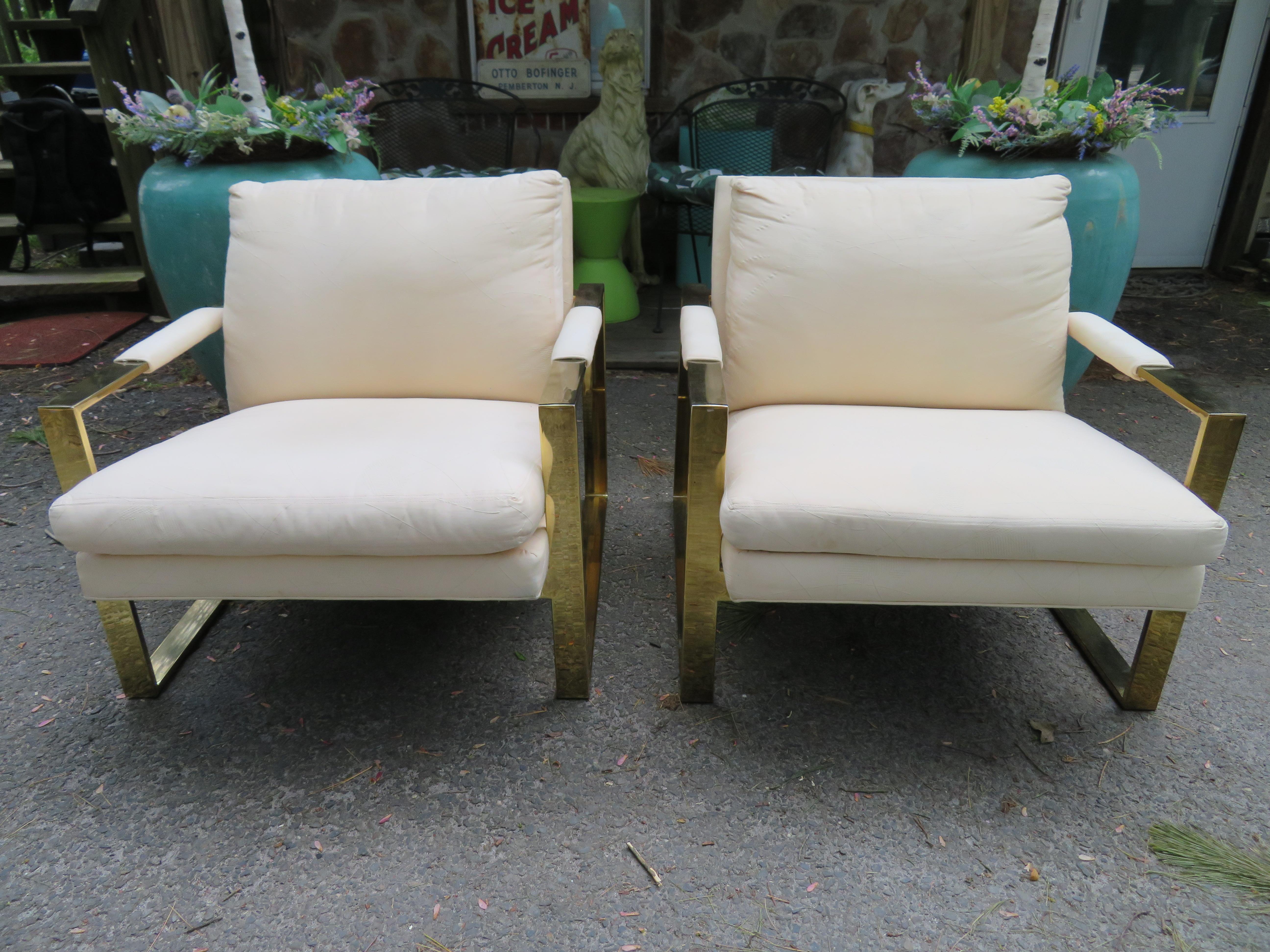 Handsome pair of Milo Baughman brass cube chairs. This pair will need to be re-upholstered so now is your chance to get exactly what you want as far as upholstery-we do have an upholstery service. Examples of authentic vintage Milo Baughman cube