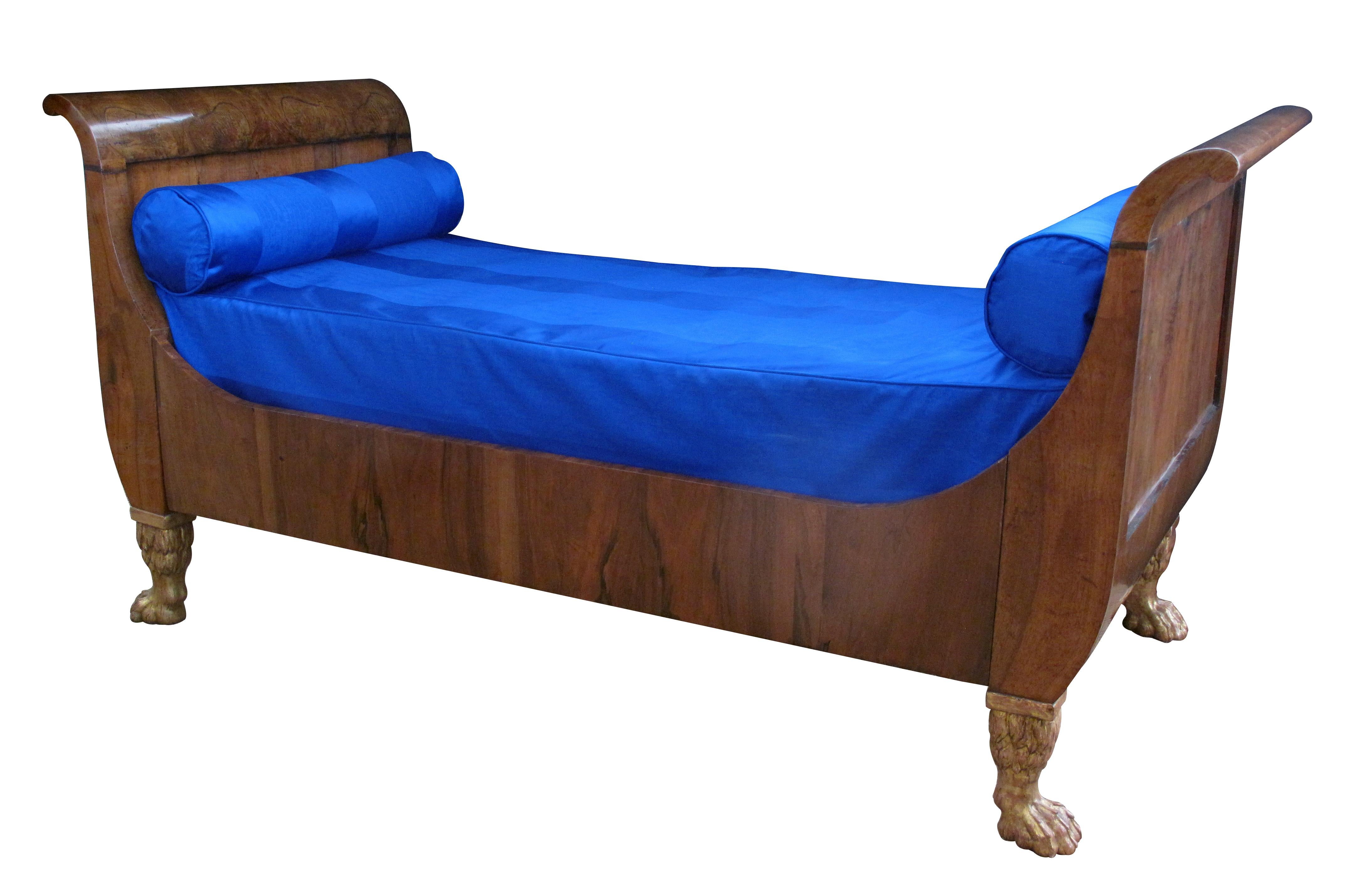 19th Century Handsome Pair of French Empire Walnut Sleigh Beds with Giltwood Hairy Paw Feet
