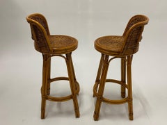 Handsome Pair of Mid-Century Modern Woven Rattan Barstools