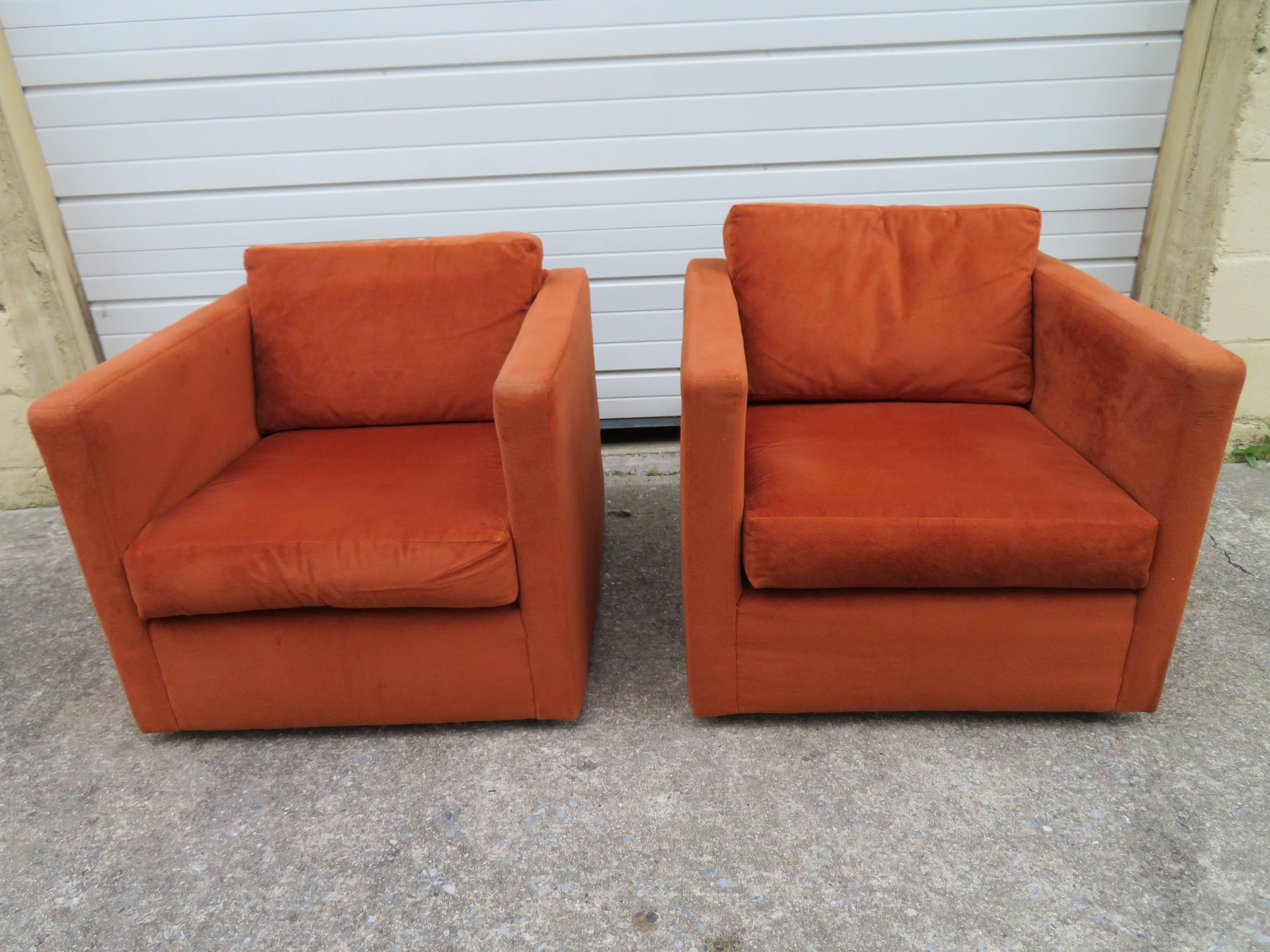 Handsome pair of Milo Baughman Thayer Coggin even arm cube chairs. This pair retain their original woven orange fabric in worn condition-reupholstery is recommended. Chairs have short stubby wooden legs-very nice.