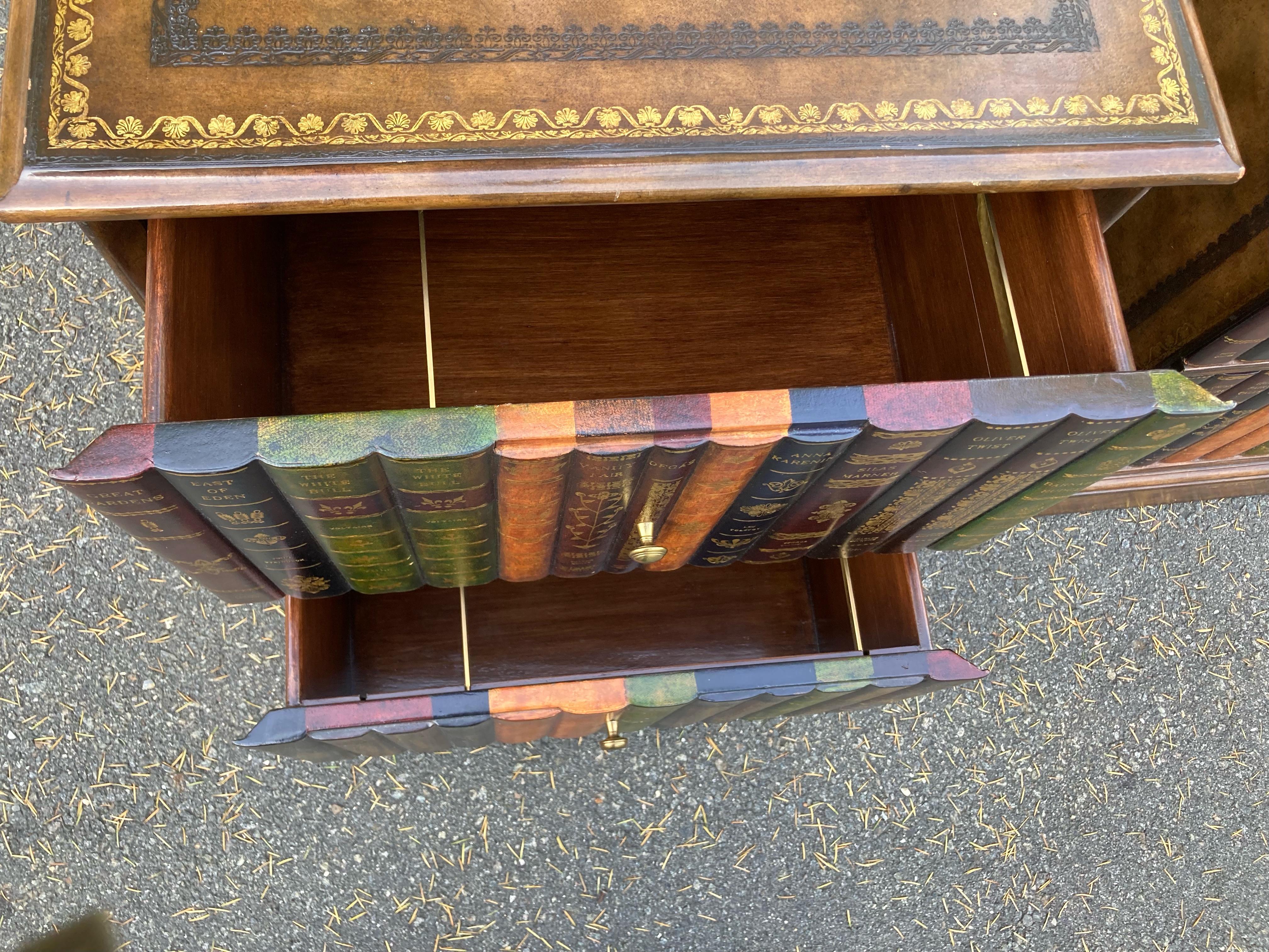 Pair of wonderfully versatile tooled leather 2 drawer file cabinets or end side tables /night stands by Maitland Smith having trompe l'oeil leather book bindings on the front of drawers. Very good condition with some minor nicks as shown in close