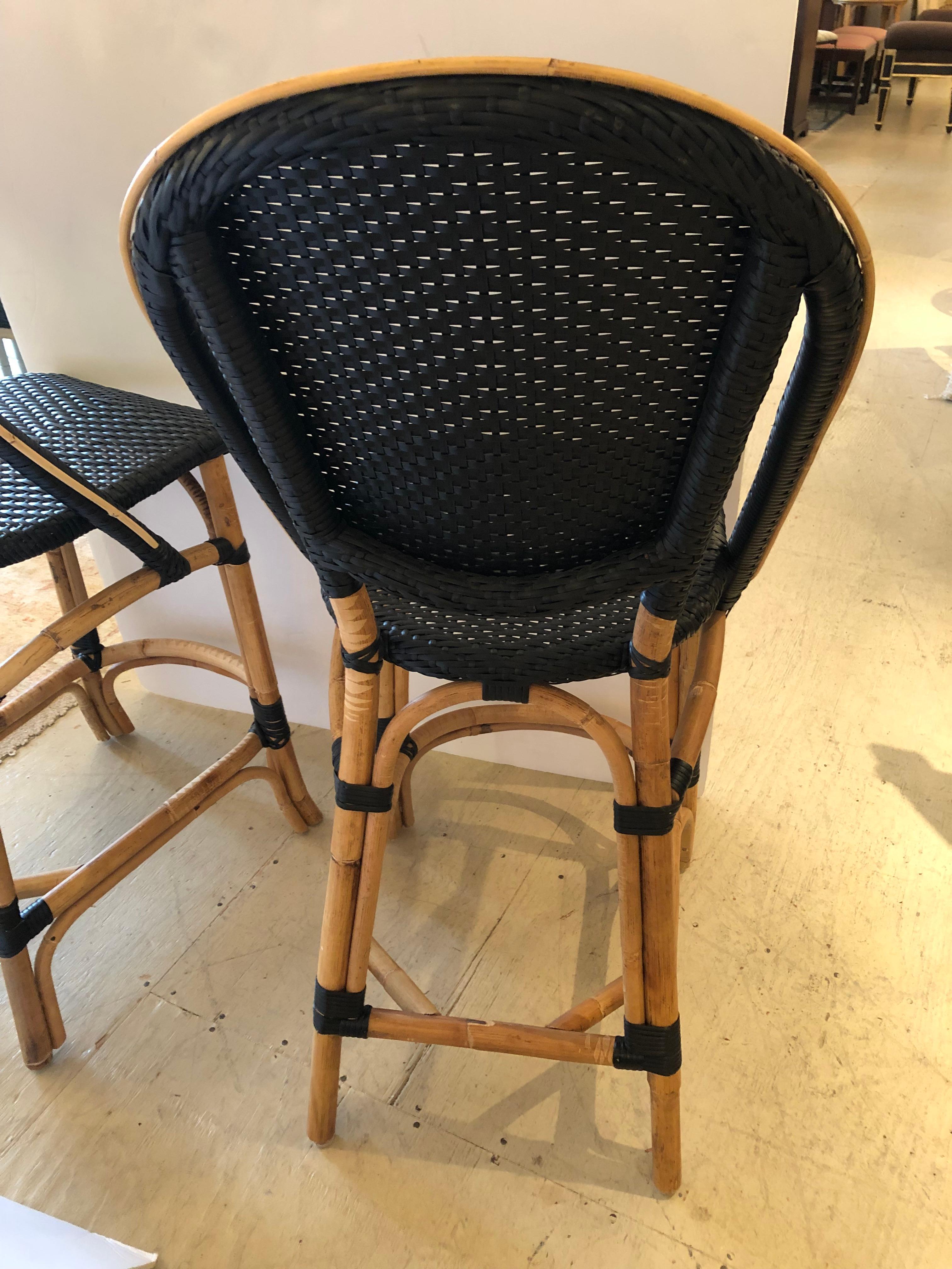 Handsome Pair or Set of 4 Rattan Black and Tan Counter Stools In Good Condition For Sale In Hopewell, NJ