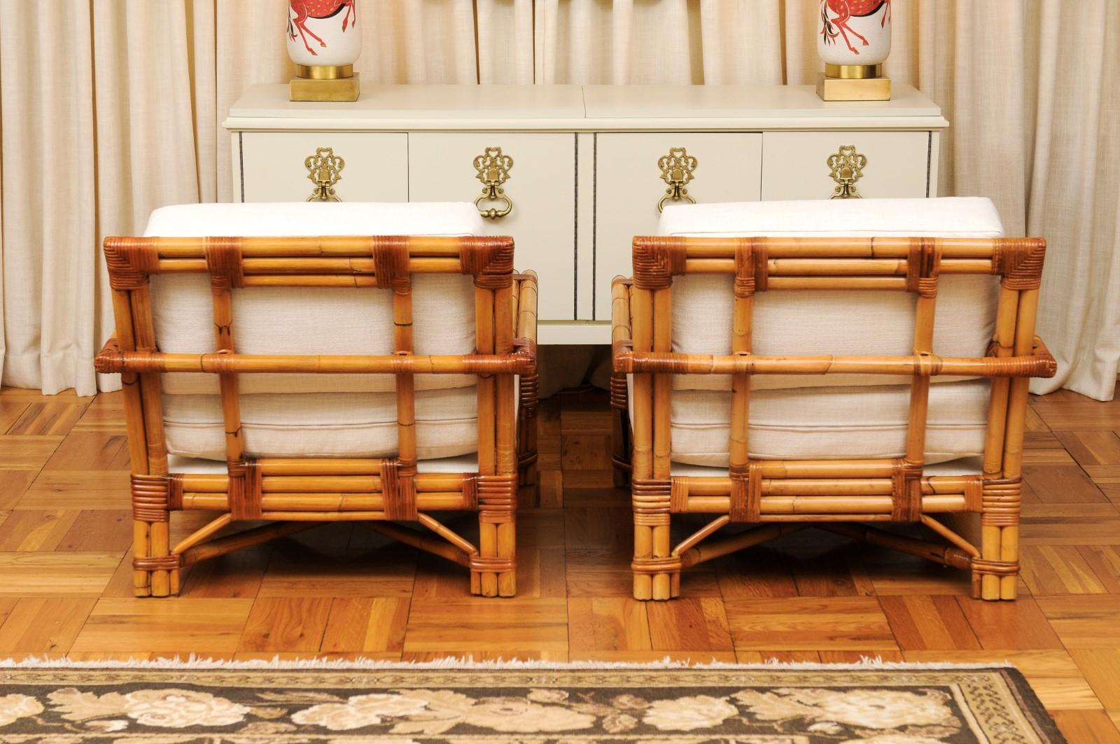 Cane Handsome Restored Pair of Large-Scale Rattan Club Chairs by Bielecky Brothers For Sale