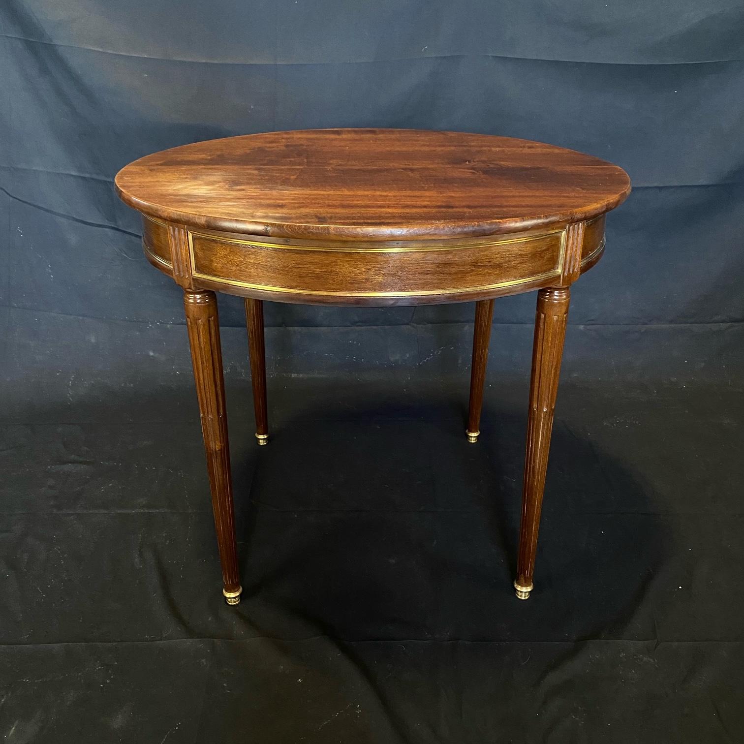 Handsome Round Louis XVI French Walnut Brass Mounted Side or Entry Center Table In Good Condition In Hopewell, NJ