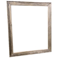 Beau cadre antique en bois et feuilles d'argent
