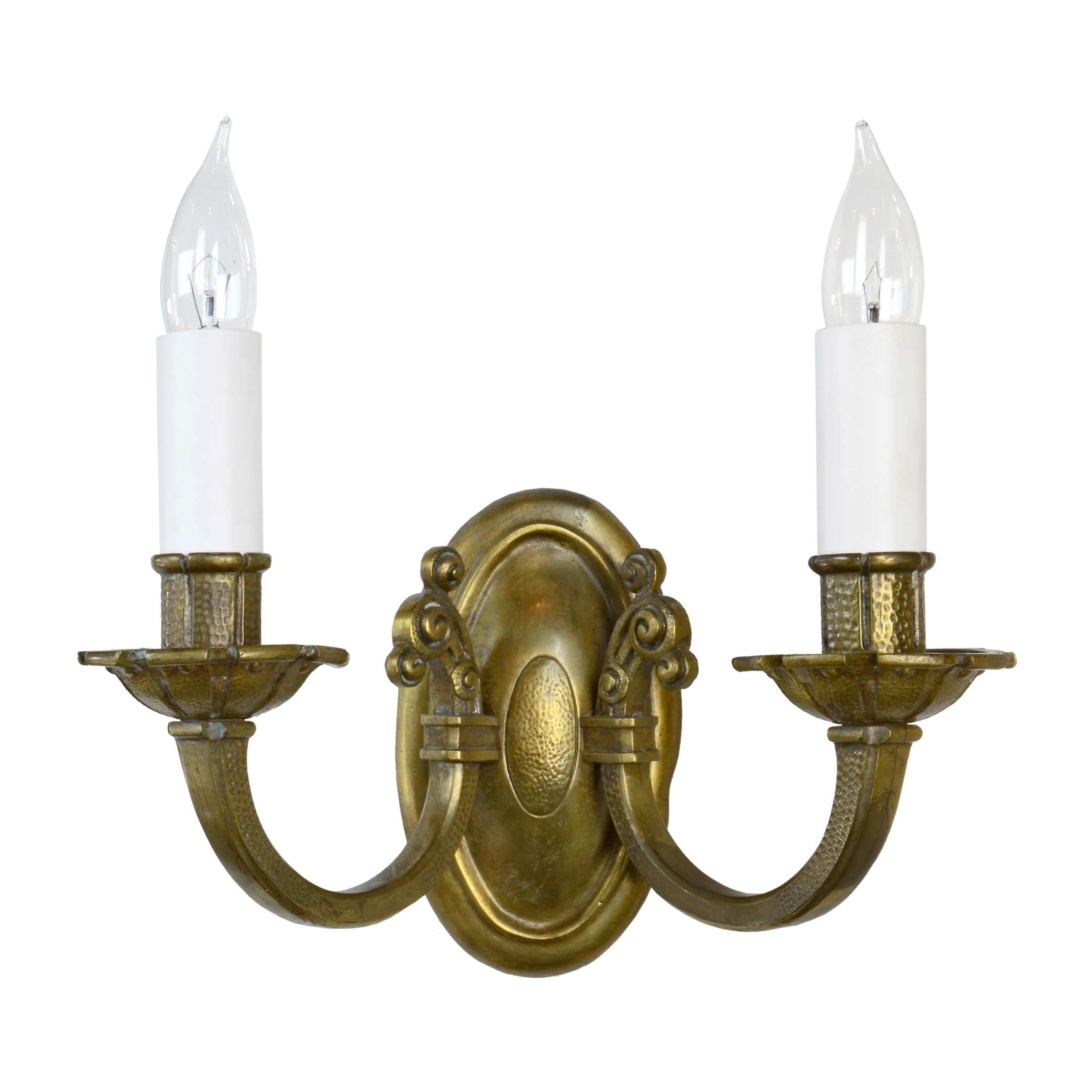 Handsome Two-Arm Hammered Cast Brass Sconce For Sale