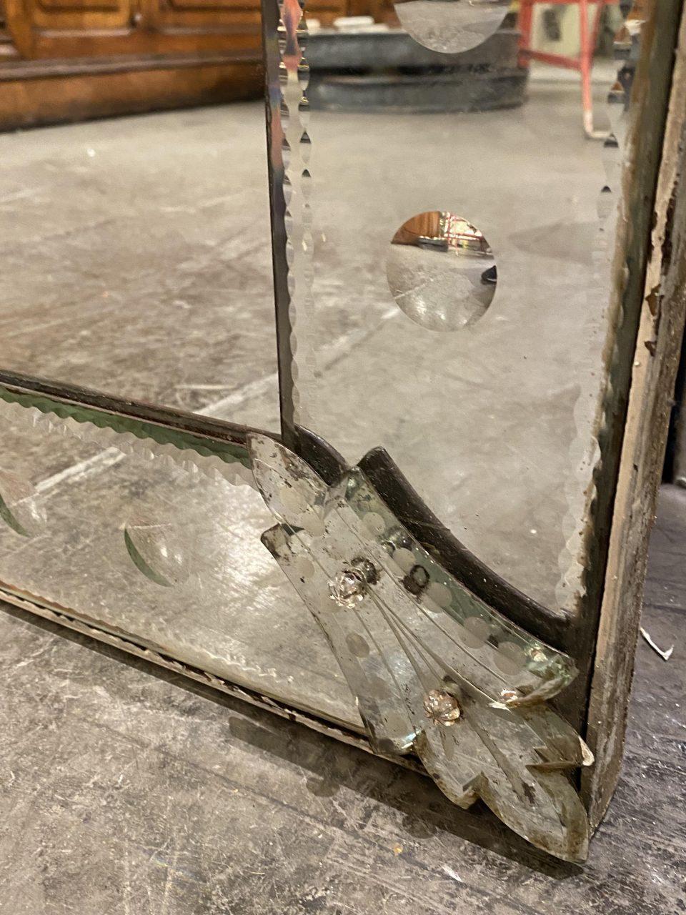 Magnificent and exceptionally tall old Venetian mirror, from France of the 1940s. Rectangular in shape and can be hung both horizontally or vertically, depending on your wishes. It is to date, the longest Venetian mirror we have had in the Fil de