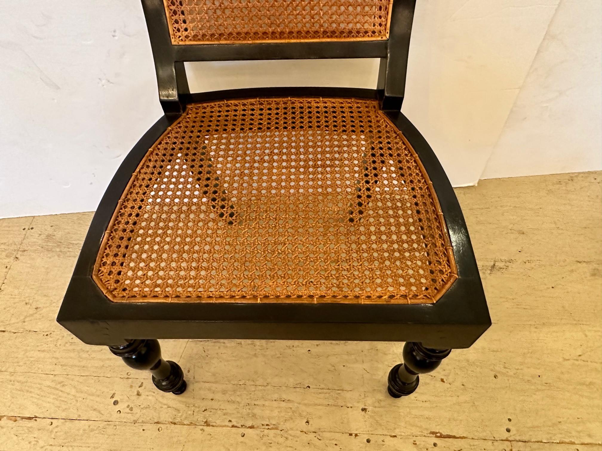 Handsome Vintage Black and Rich Brown Caned Desk Chair In Good Condition For Sale In Hopewell, NJ