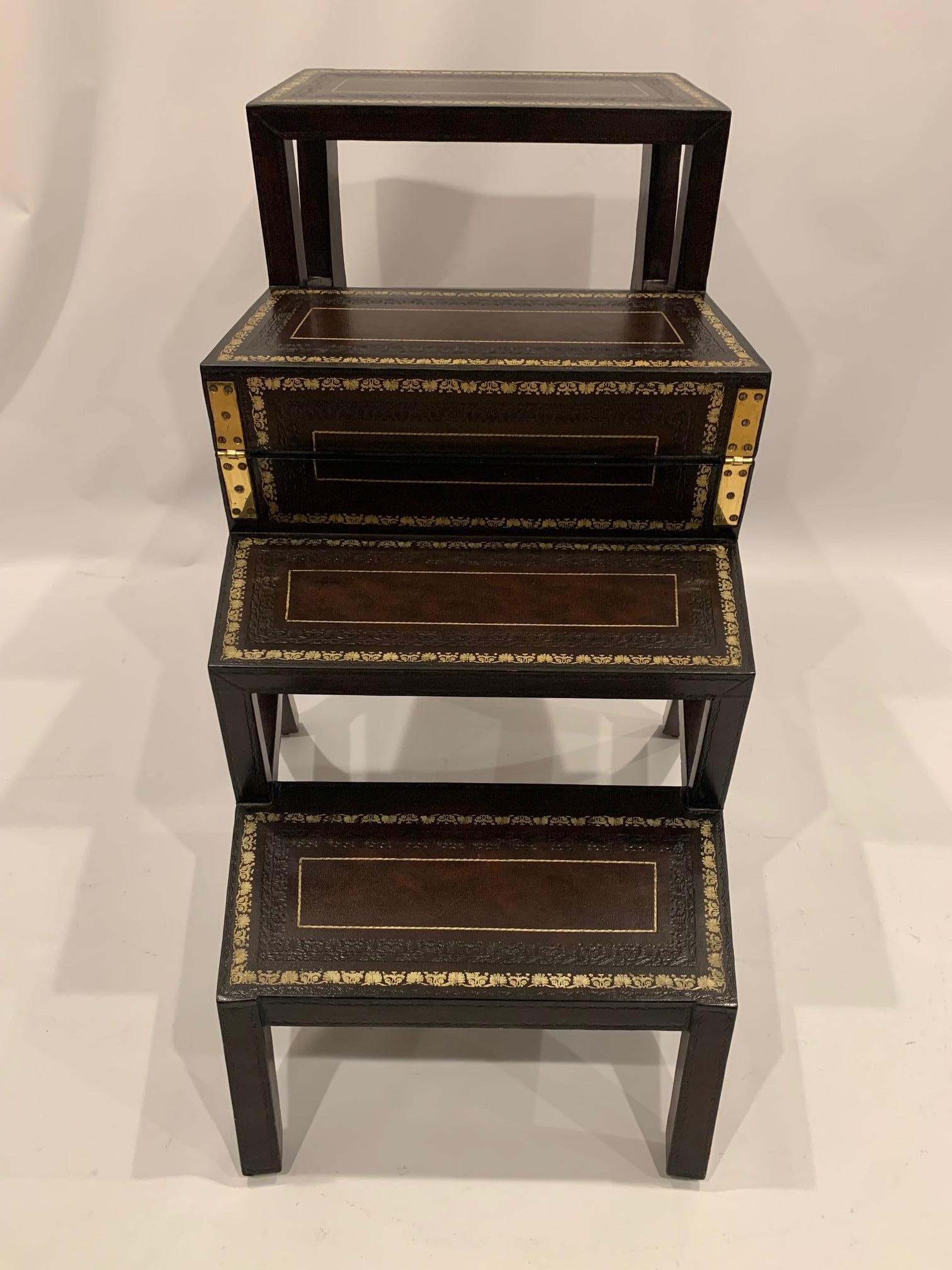 A cleverly crafted chair that opens to become functional library steps having handsome mahogany structure wrapped in gorgeous tooled leather. 
Chair is 35 H x 23 D x 21.5 W.