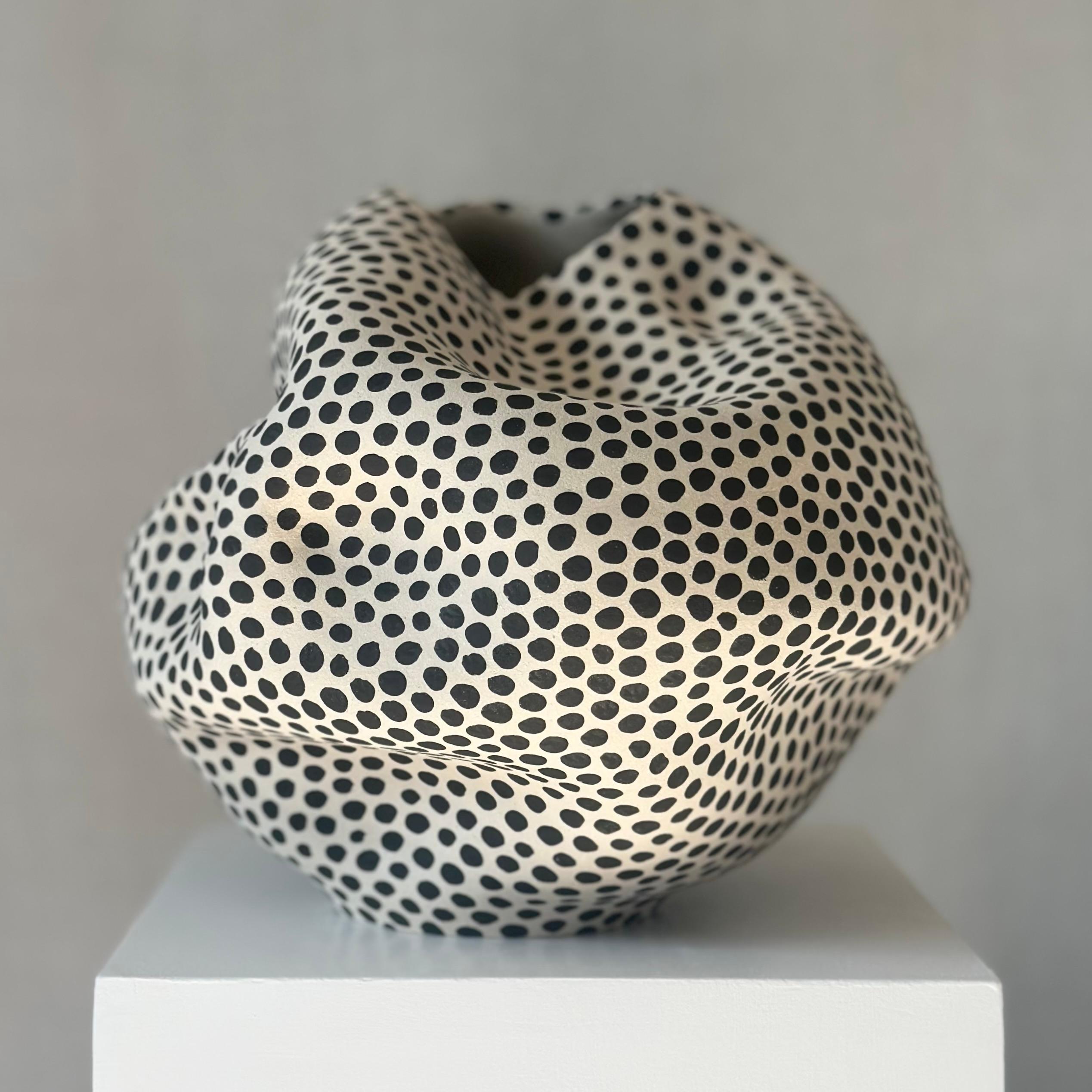 Hand thrown and altered ceramic vase by Norwegian artist Johanne Birkeland.  

Birkeland, who works under the artist name Jossolini, is known for her special techniques in altering her wheel thrown forms.   

Once the form has been thrown and