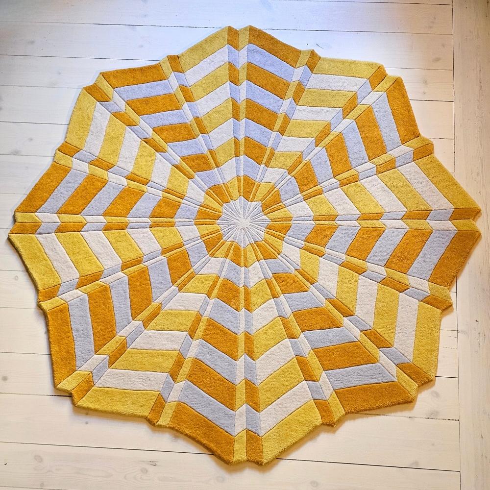 Custom hand tufted rug based on the artwork “Star”, painted by Swedish artist Annika Johansson.

Sustainable and certified fair-trade artisanal production. Label Step fair-trade partners. 

Colors: 4 custom-dyed colors. Main colors in the rug: