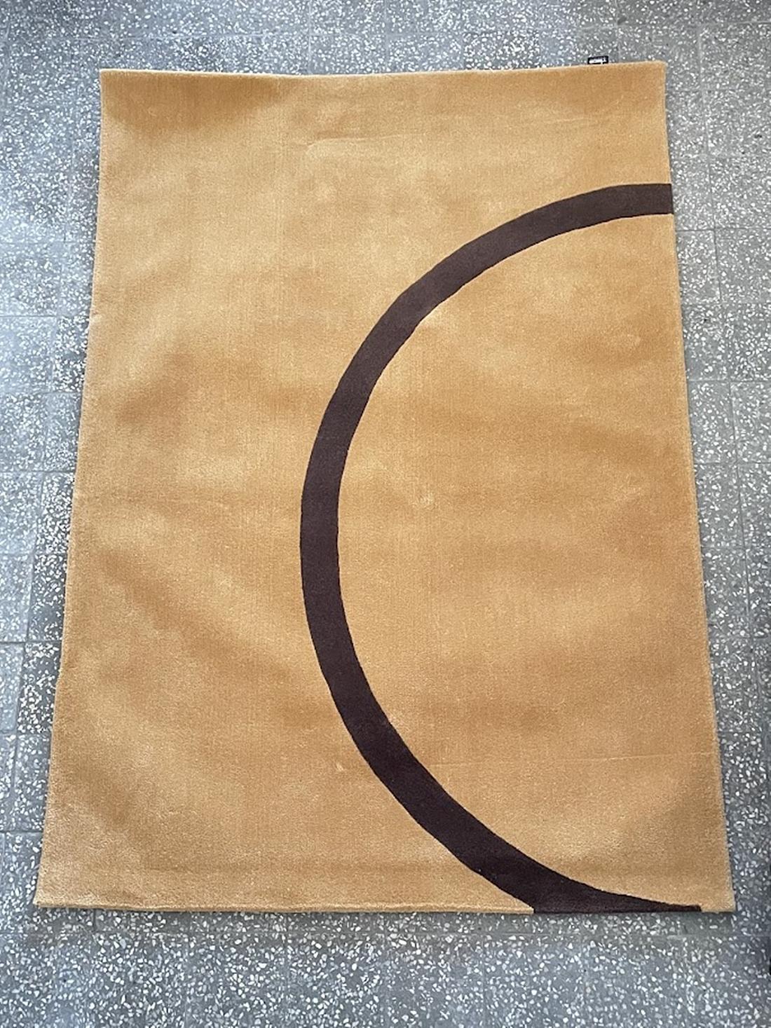 Add a touch of modern elegance to any room with this vintage, hand-stitched Tisca rug. Made in Switzerland in the 1980s, this rug will brighten up any space. Measuring 200 cm long and 140 cm wide, the rug is perfect for a variety of rooms, including