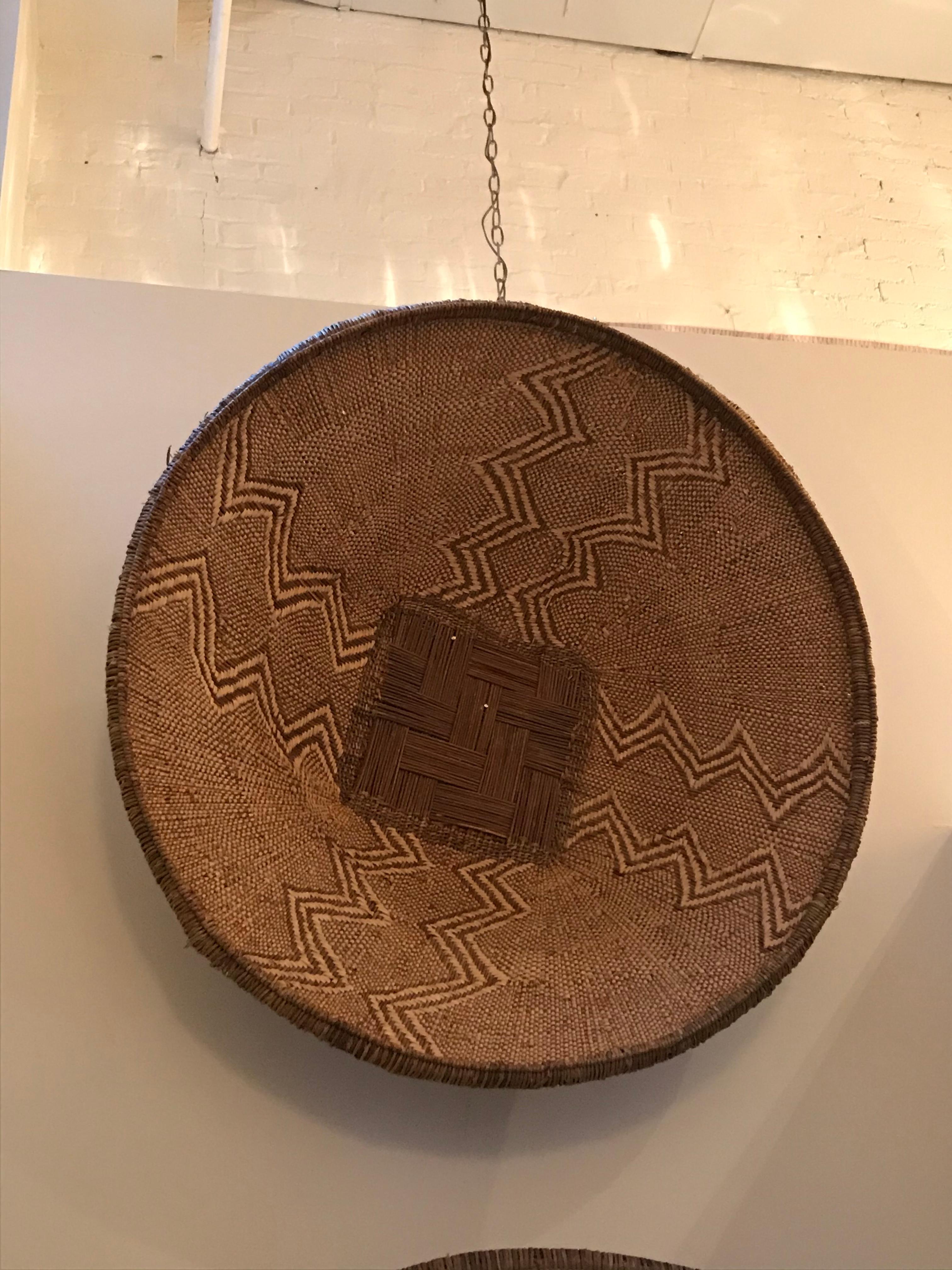 Large handwoven African BaTonga basket, perfect for a wall statement.