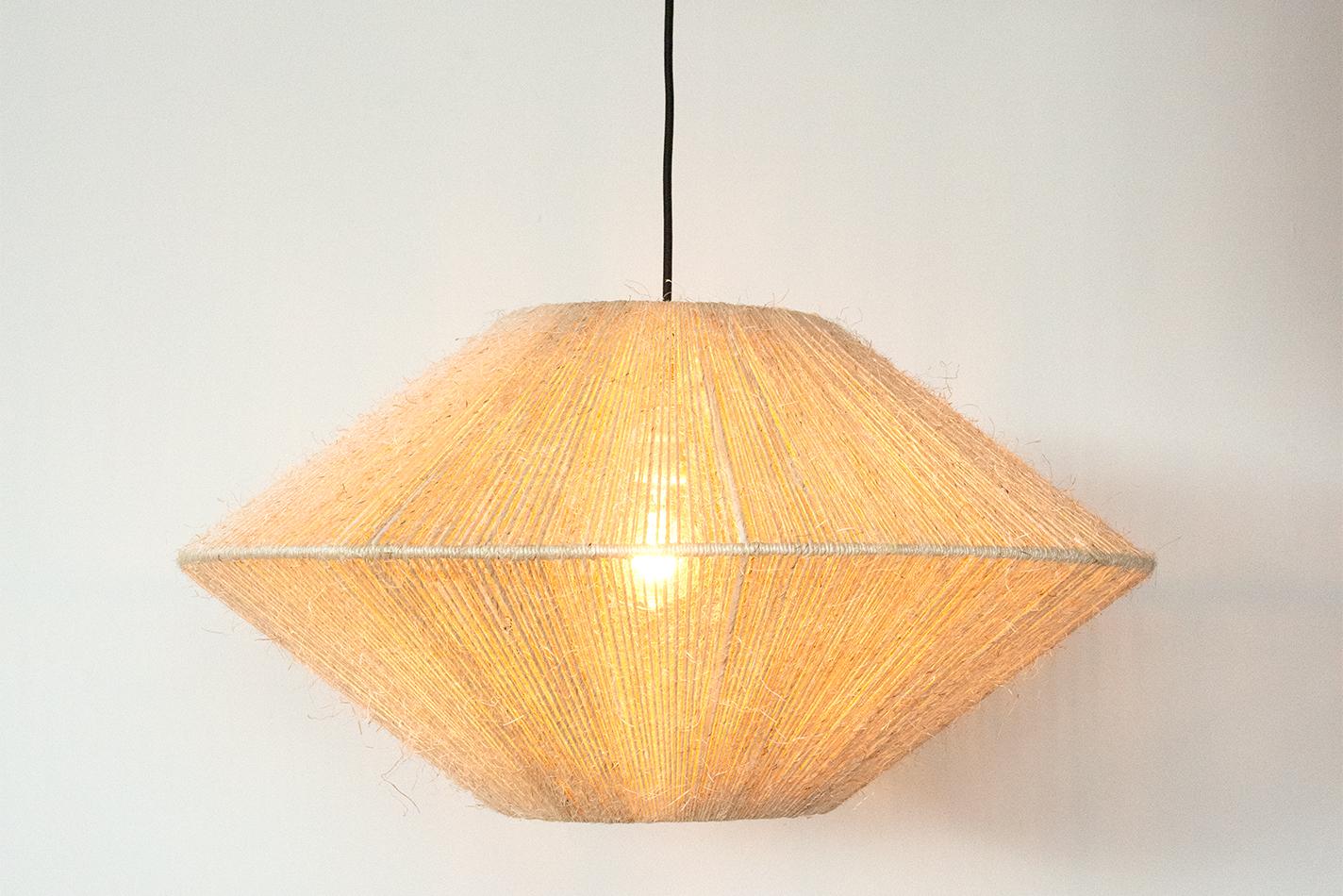 This Handwoven Henequén Hunter light screen is a unique creation by León León Design from Mexico City. 
Henequén is the name for the Agave fibers used to make this special weaving rope. The same Agave that gives us Tequila and Mezcal. 

The