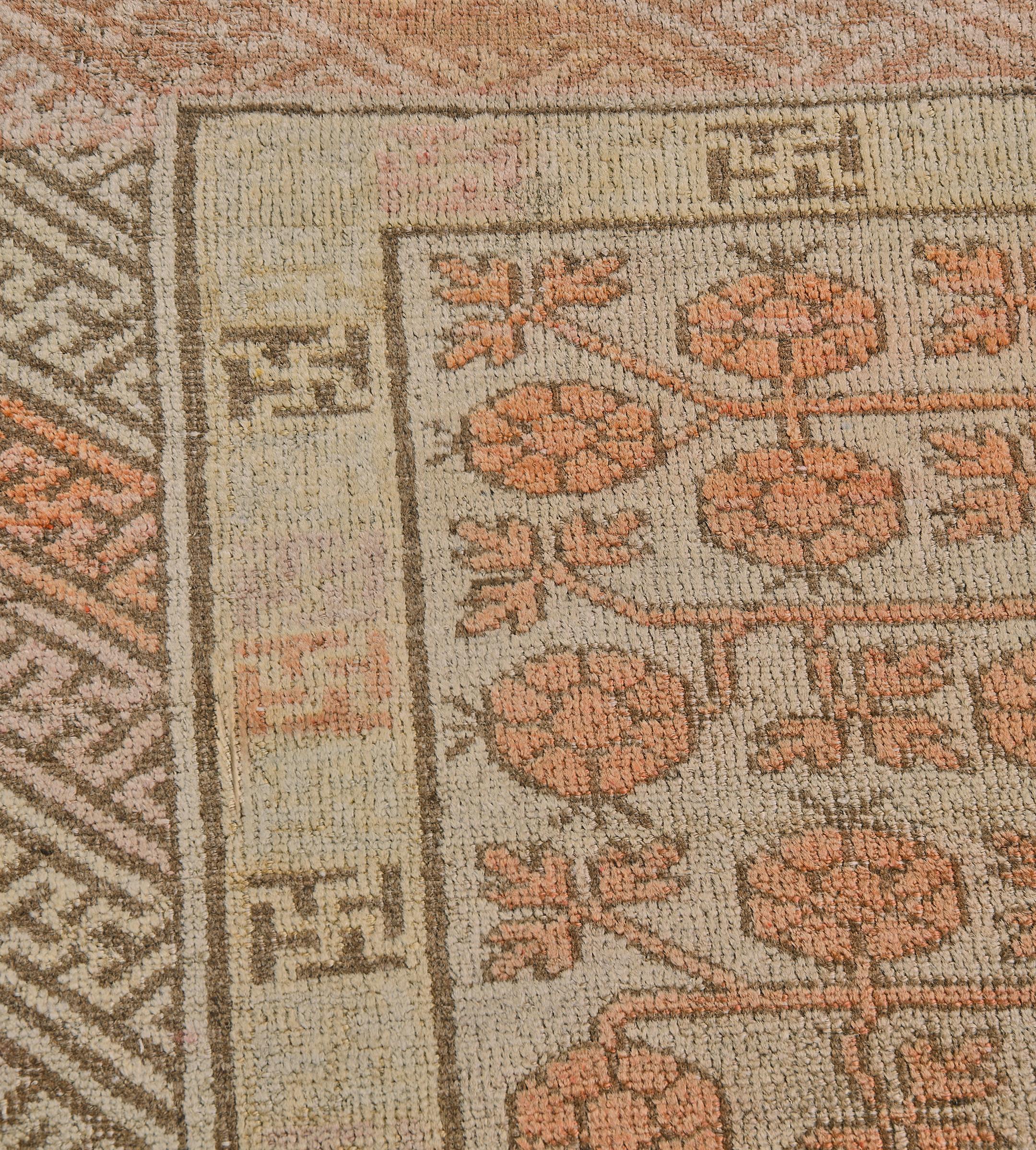 Handwoven Antique Buff-Brown Pomegranate Khotan Rug In Good Condition For Sale In West Hollywood, CA