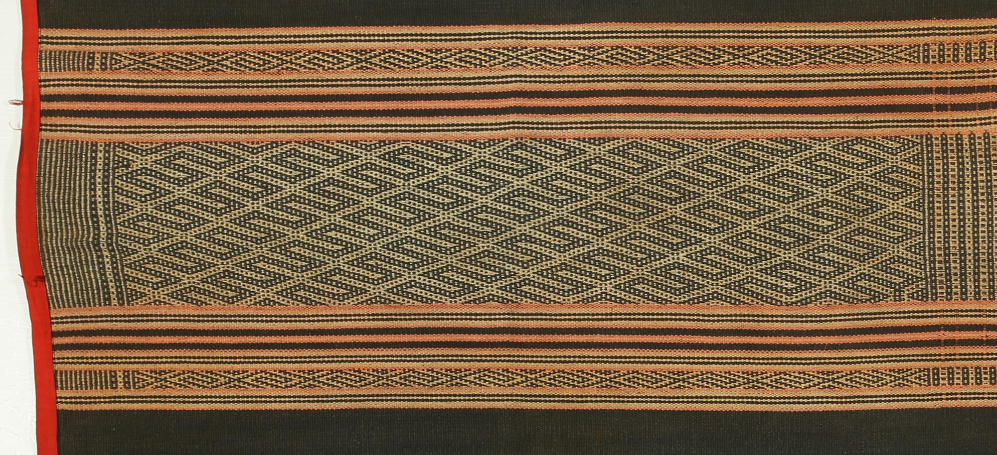 Early to mid-20th century handwoven cotton three-part skirt textile, central highlands, Vietnam.
Woven on a traditional back-strap loom by a woman of the Mnong people, Dec Lac Province, Central Highlands of Vietnam. Wonderful asymmetrical geometric
