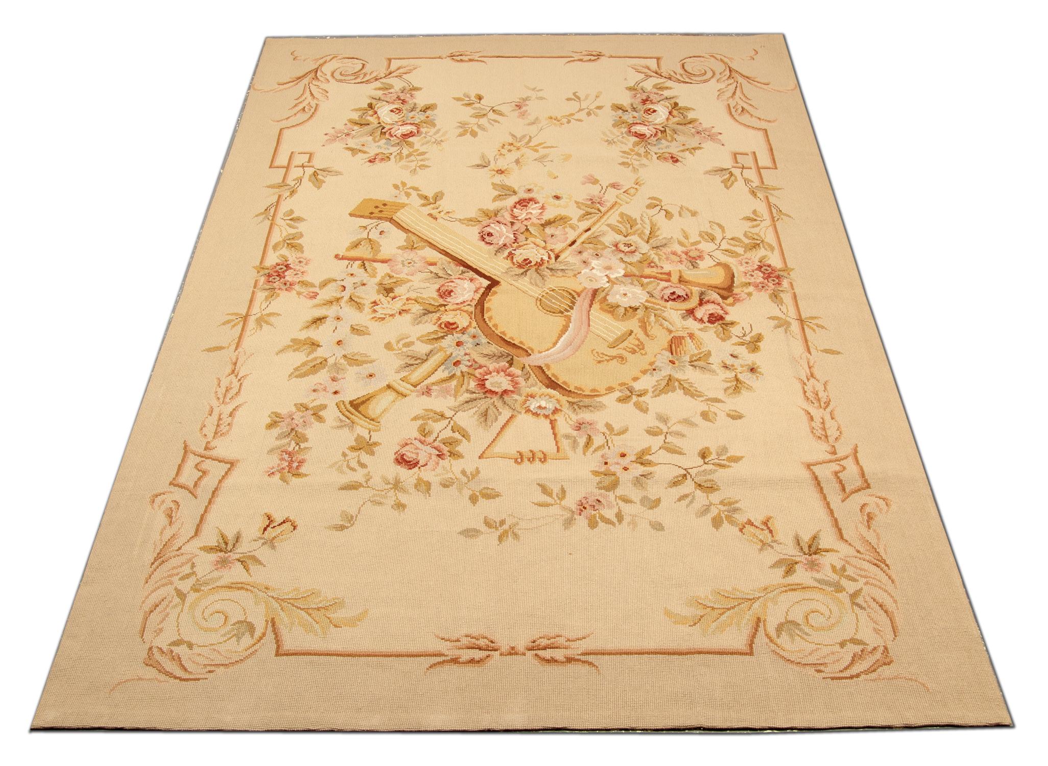 This handwoven decorative tapestry was woven in the 21st century in China. Constructed for large the western interior design market. The French style features a musical design with a guitar woven in the center surrounded by a floral bouquet. Perfect