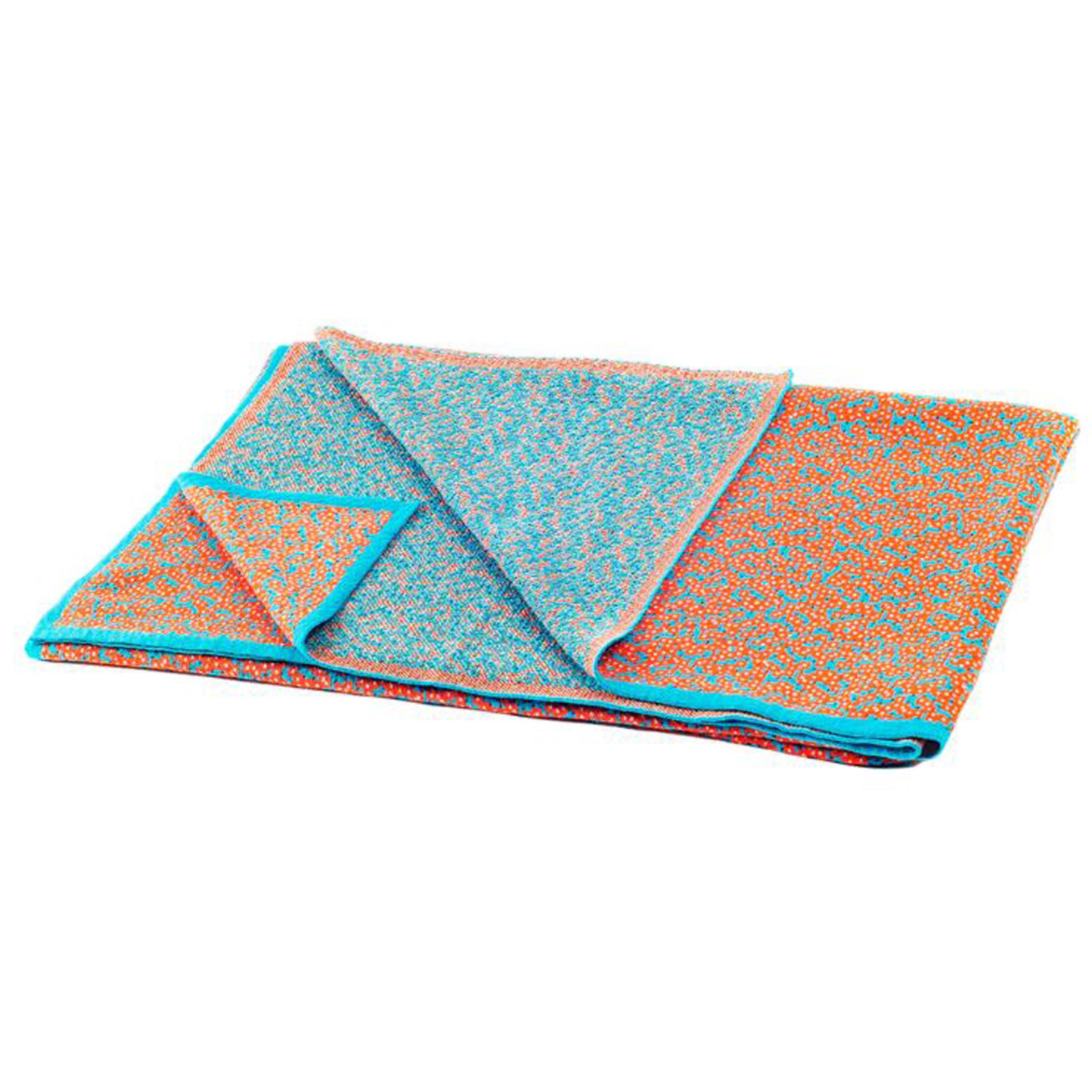 Hand-woven Orange and light blue throw designed by Cristian Zuzunaga, made of high-quality cotton with a hint of nylon, lending the product a gentle stretch effect. Blanket knitted using a jacquard technique with four contrasting colors - three in