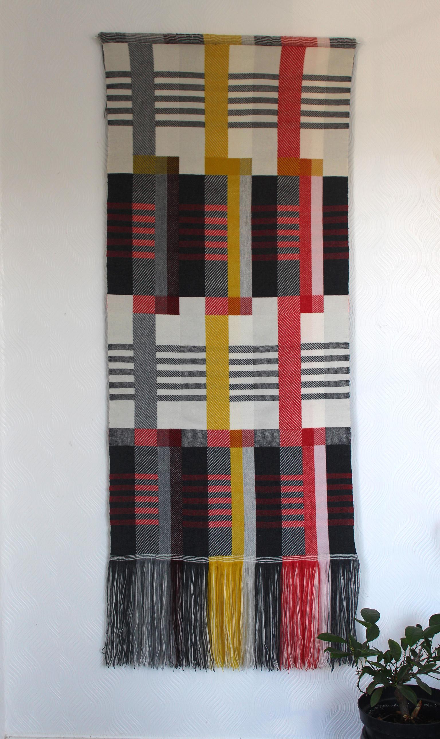 Handwoven on a dobby loom in Pamela's studio using a complex double cloth weaving technique and a combination of weave structures, this unique, striking wall hanging draws inspiration from the Art Deco and Bauhaus movements.

One of a kind. Bespoke