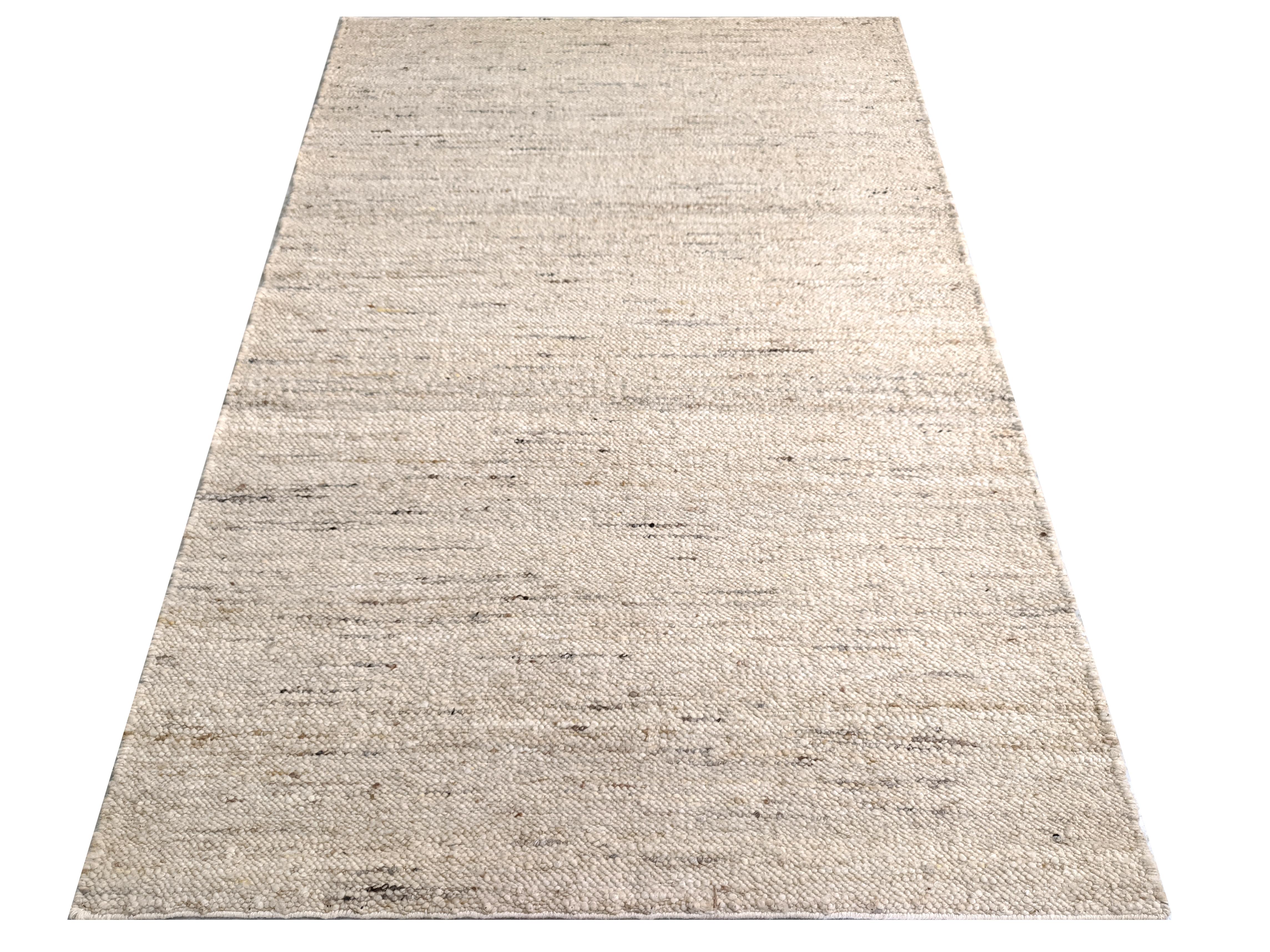 Hand-knotted, flatweave bleached wool.

9' x 12'

New

Origin: India

Field Colors: Multicolored

Accent Colors: Ivory, Light-Brown, Brown, Charcoal, Gray