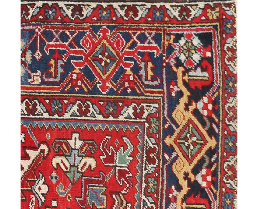 Heriz Serapi Handwoven Heriz Red Colored Field and Navy Border For Sale