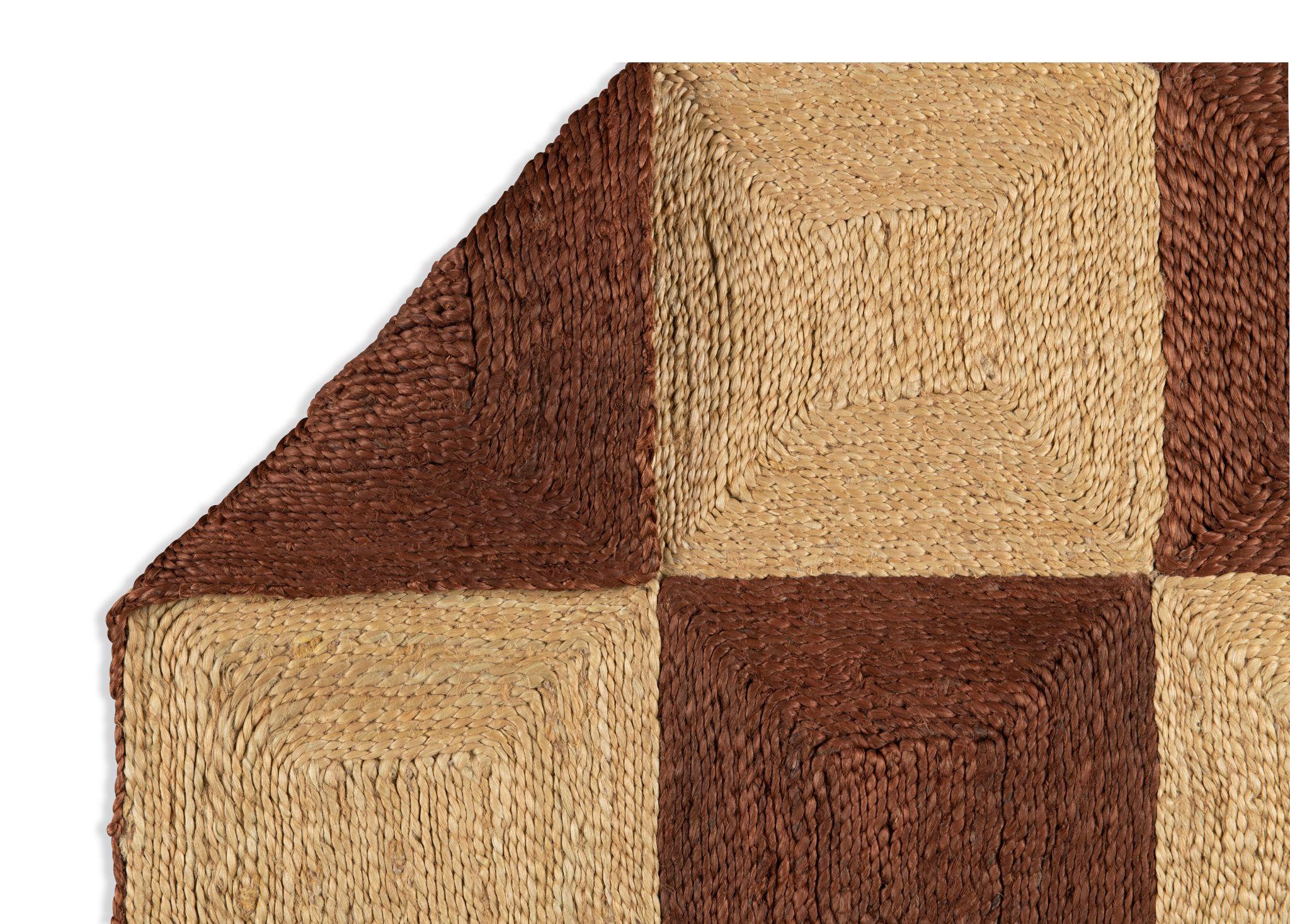 The Block Rug is our most intricate and detailed natural fiber rug. Woven by true artisans, the unique hive weave creates a dynamic pattern-on-pattern design. Equally impactful in neutral or bold hues, the Block Rug epitomizes easy elegance for the